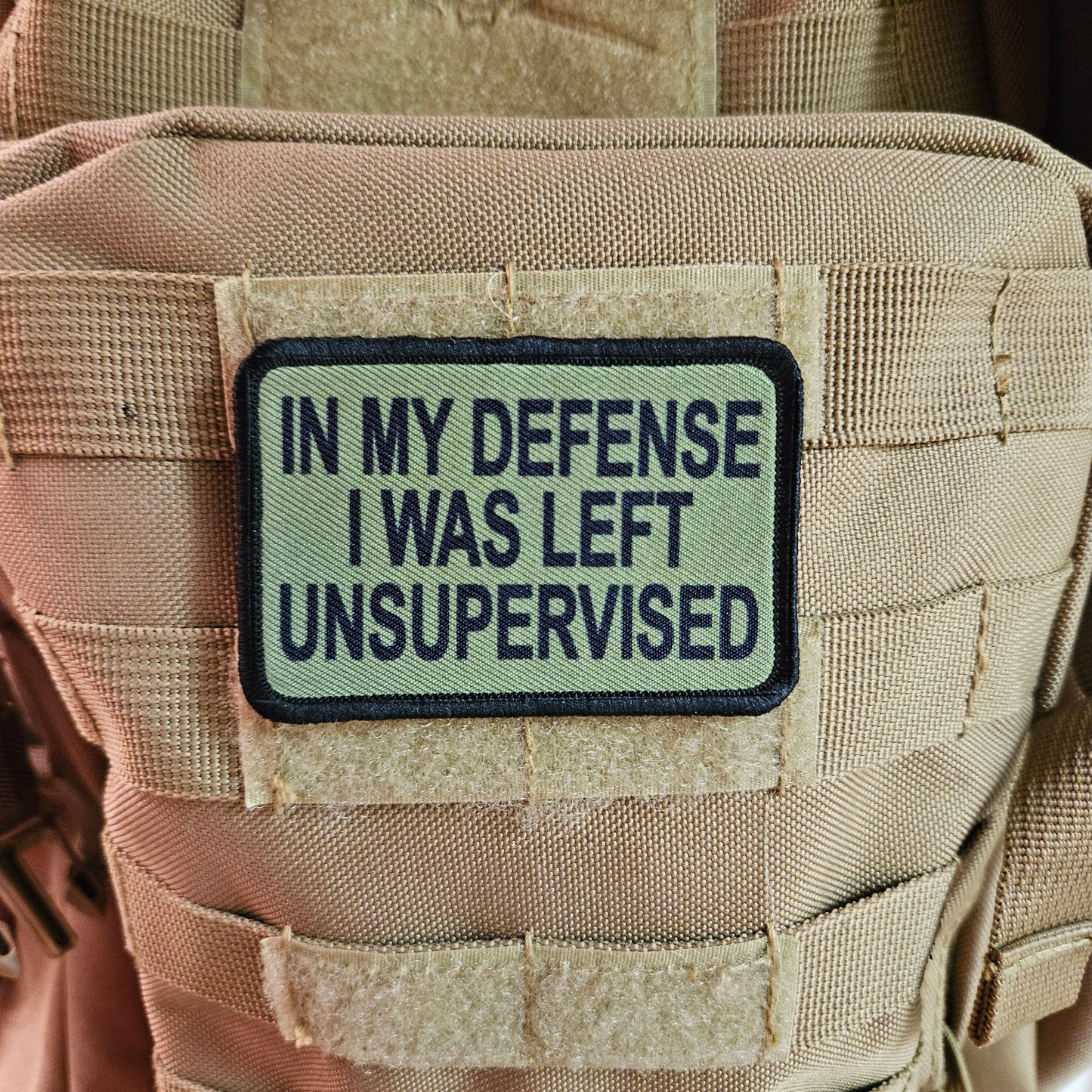 Green In My Defense I was left Unsupervised removable patch 2"x3" morale patch with hook and loop backing