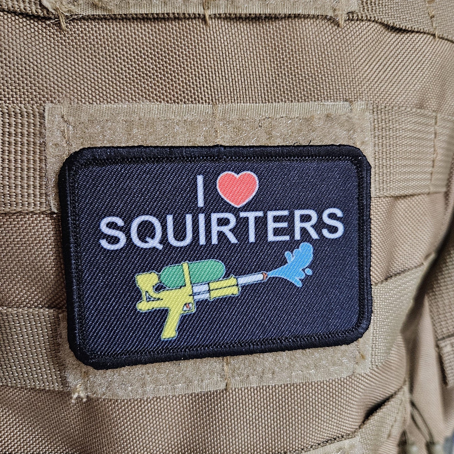 I love squirters meme 2"x3" morale patch with hook and loop backing