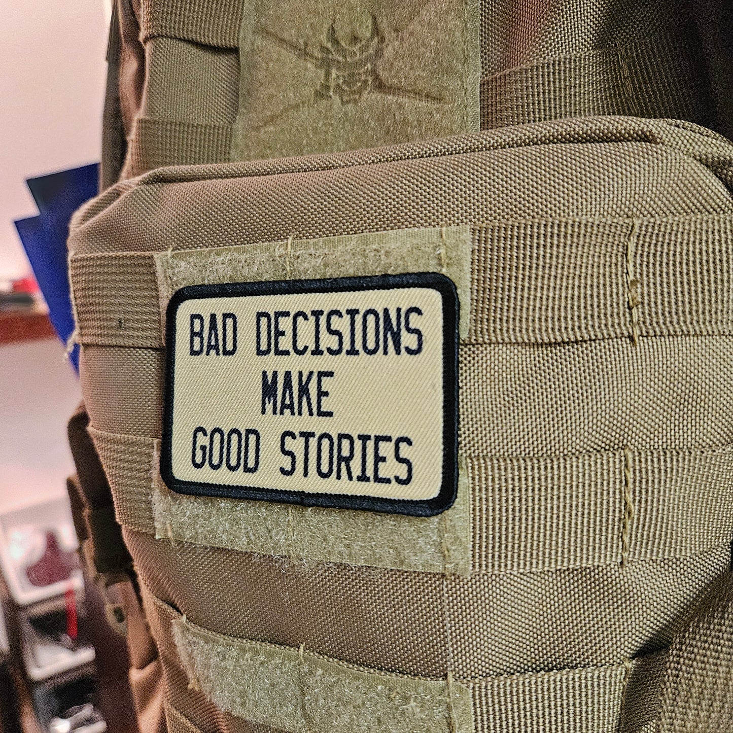 Bad decisions make good stories funny meme 2"x3" removable morale patch with hook and loop backing tan