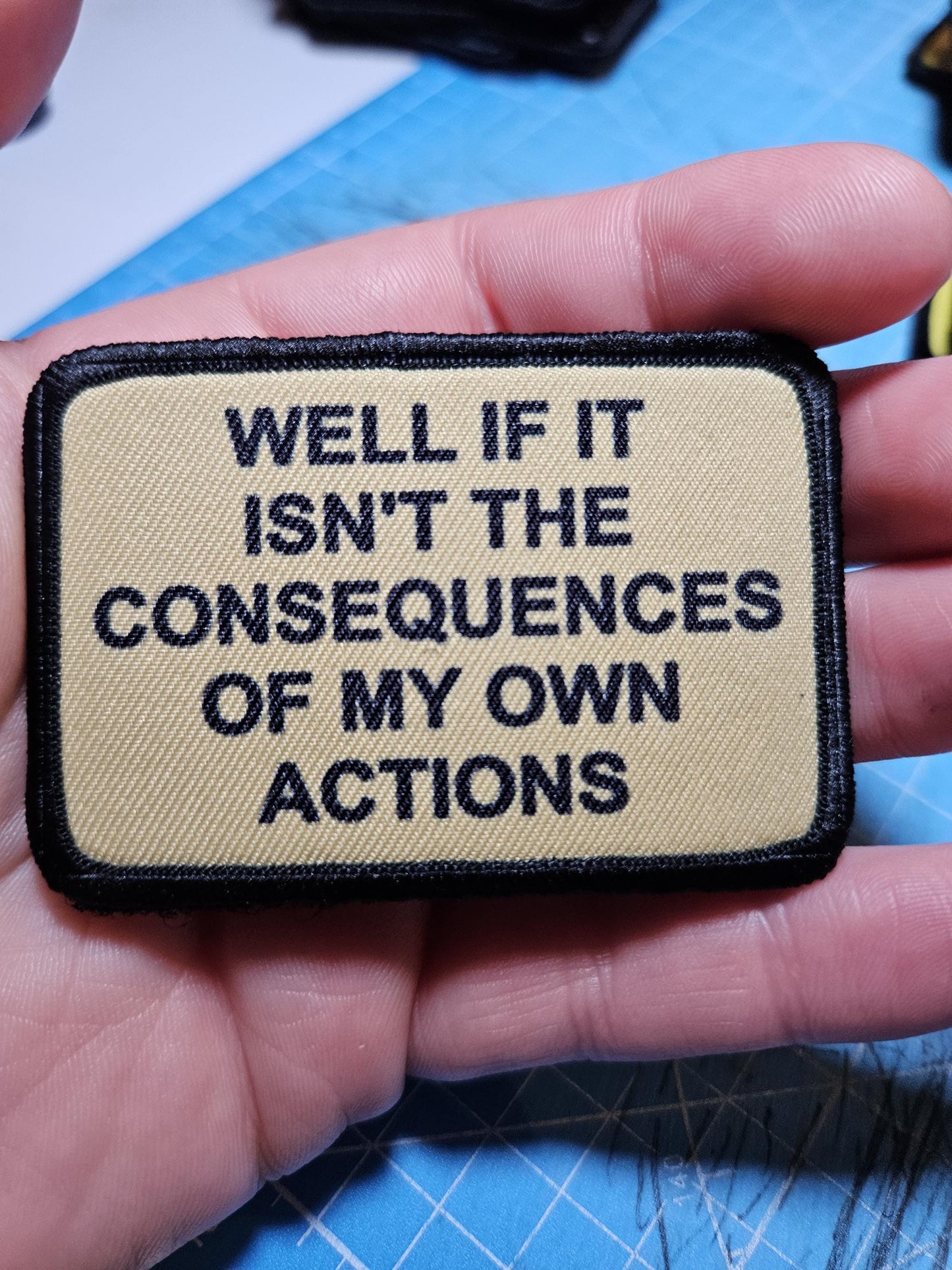 Well if it isn't the consequences of my own actions meme 2"x3" morale patch with hook and loop backing tan