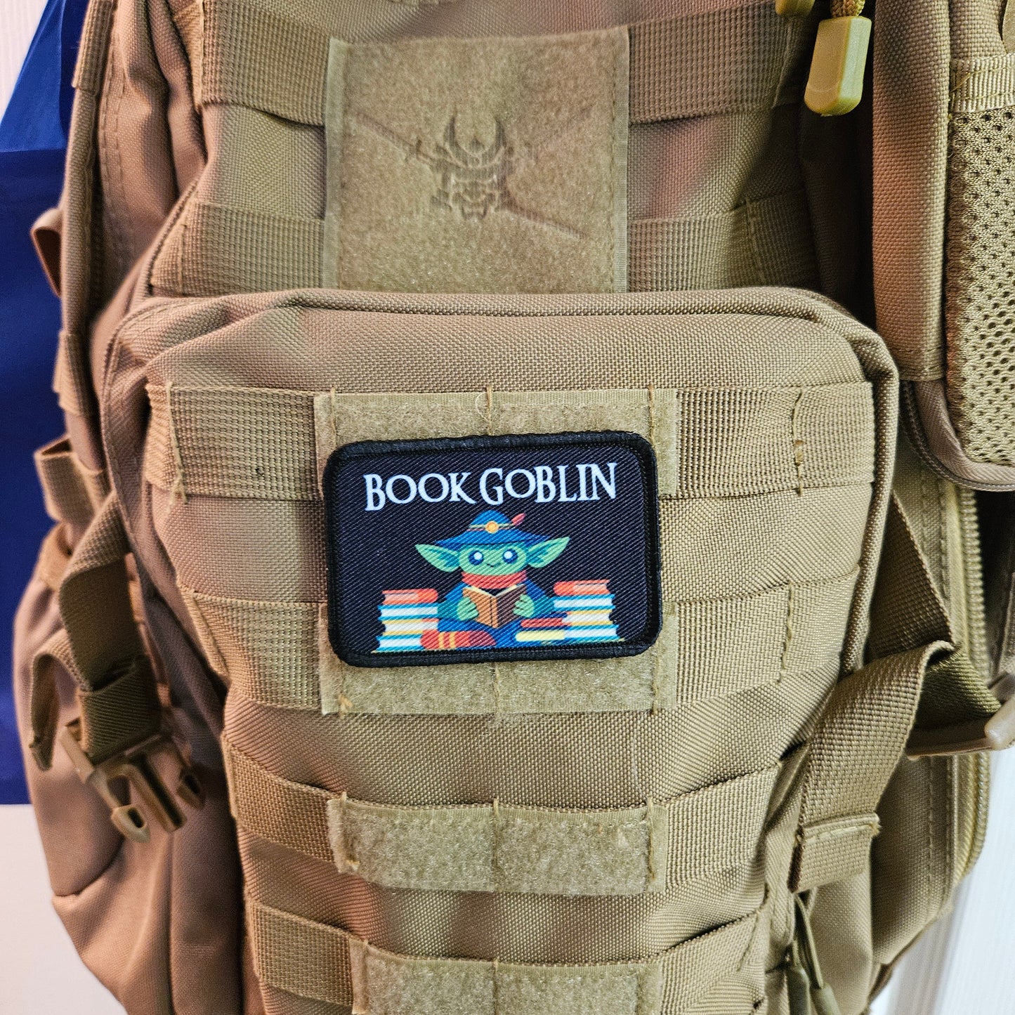 Book goblin reading joke book collection meme 2"x3" removable morale patch with hook and loop backing