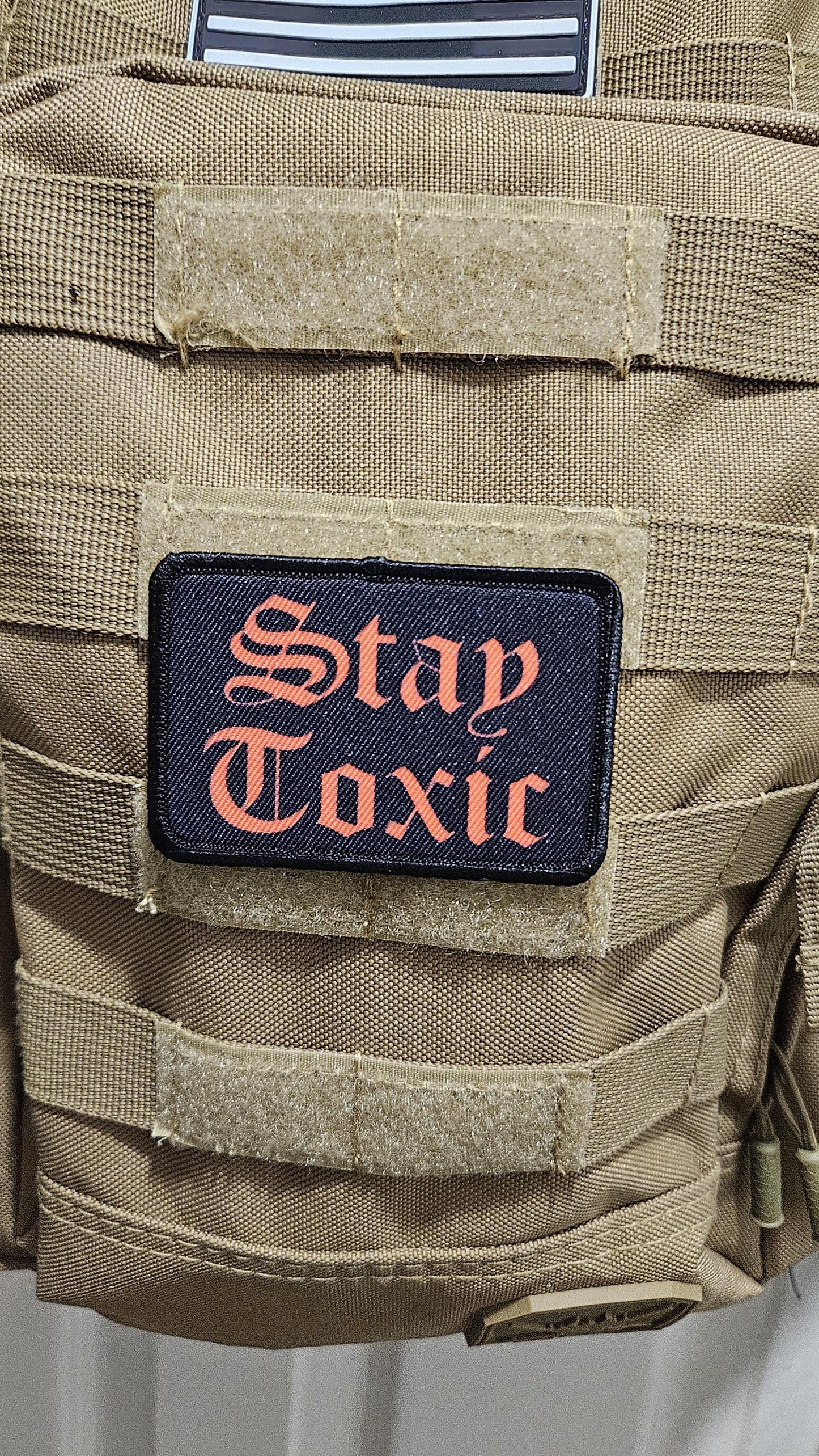 Stay toxic meme red on black 2"x3" removable morale patch with hook and loop backing