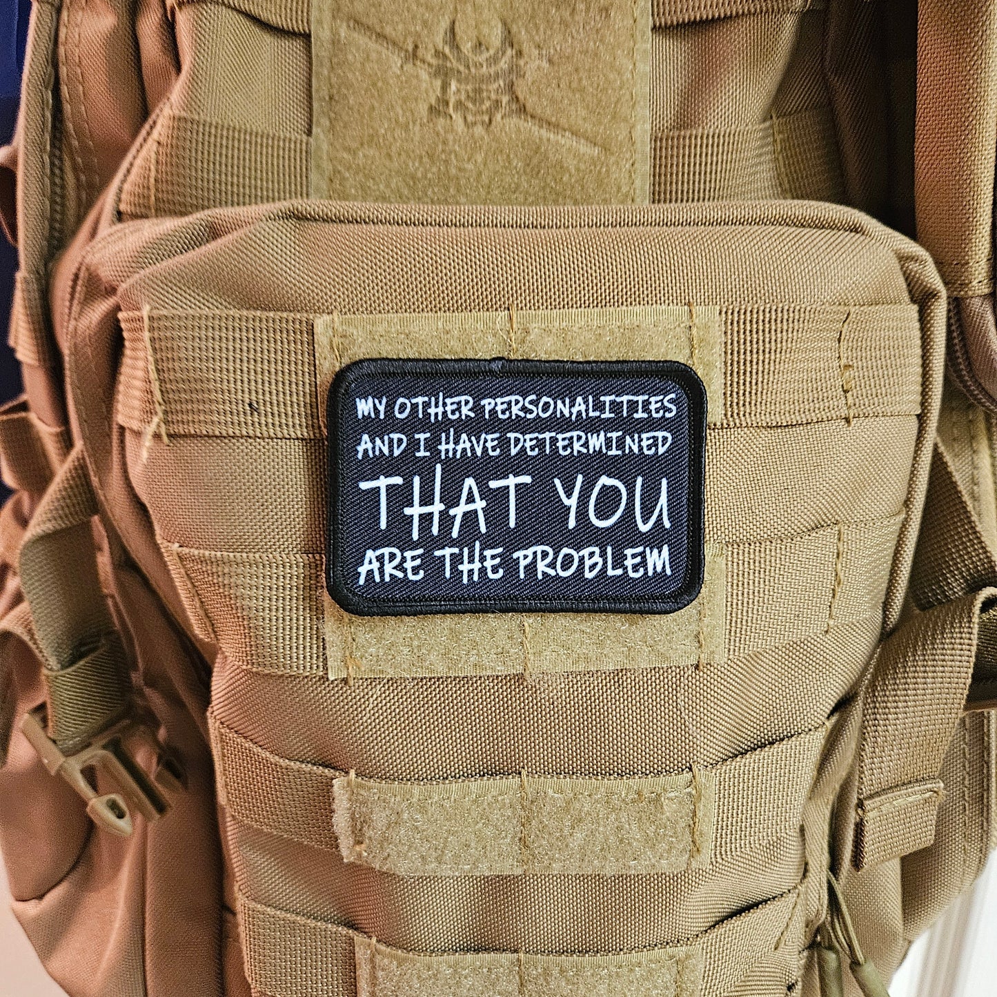 My other personalities and I have determined that you are the problem patch 2" x3" inch morale patch hook and loop backing black and white
