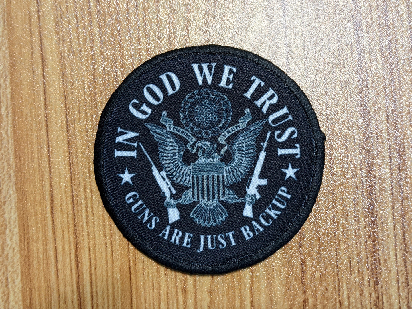 In God we Trust Guns Are Just Backup 3" circle removable morale patch with hook and loop backing