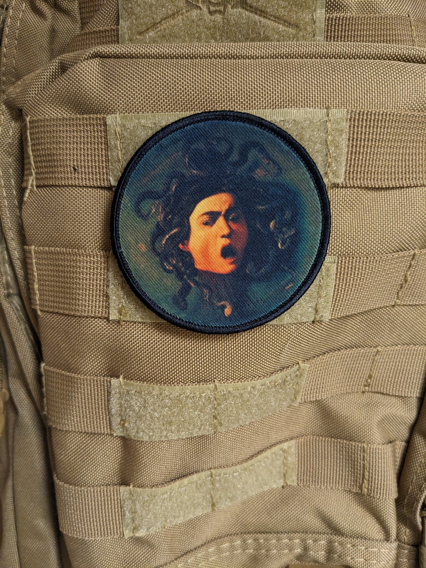 Da Vinci head of Medusa Renaissance art 3" circle morale patch with hook and loop backing