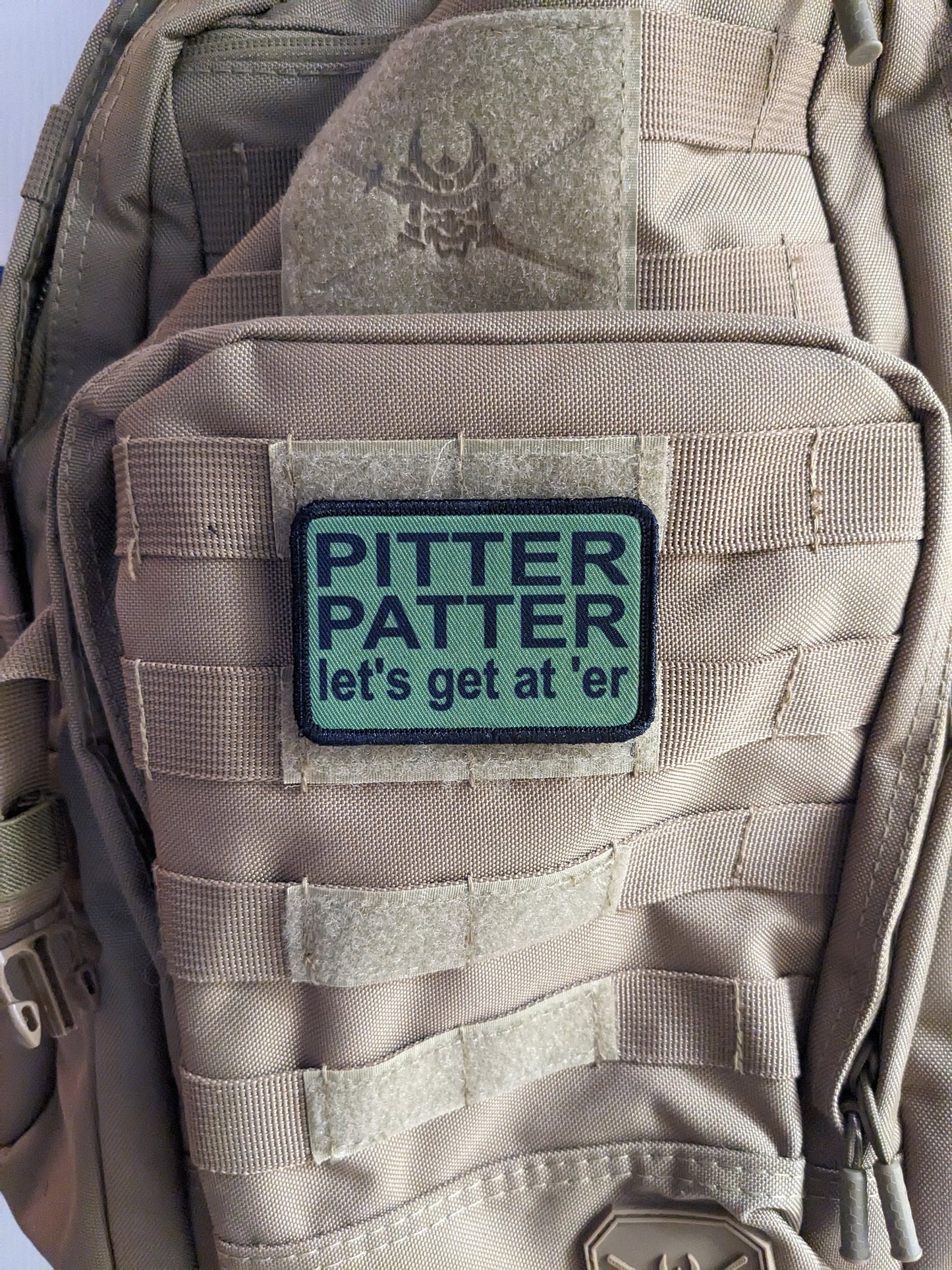 Olive green Pitter patter let's get at 'er meme 2"x3" removable morale patch with hook and loop backing