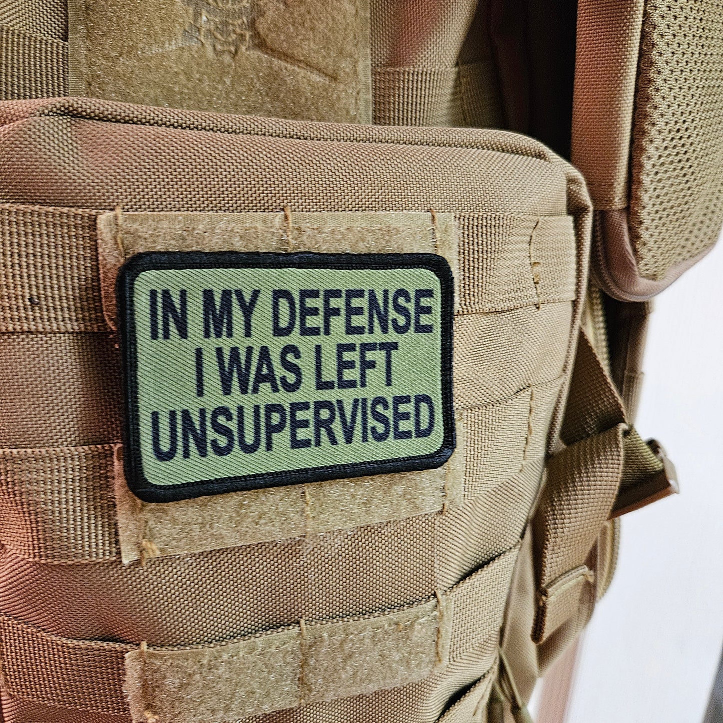 Green In My Defense I was left Unsupervised removable patch 2"x3" morale patch with hook and loop backing