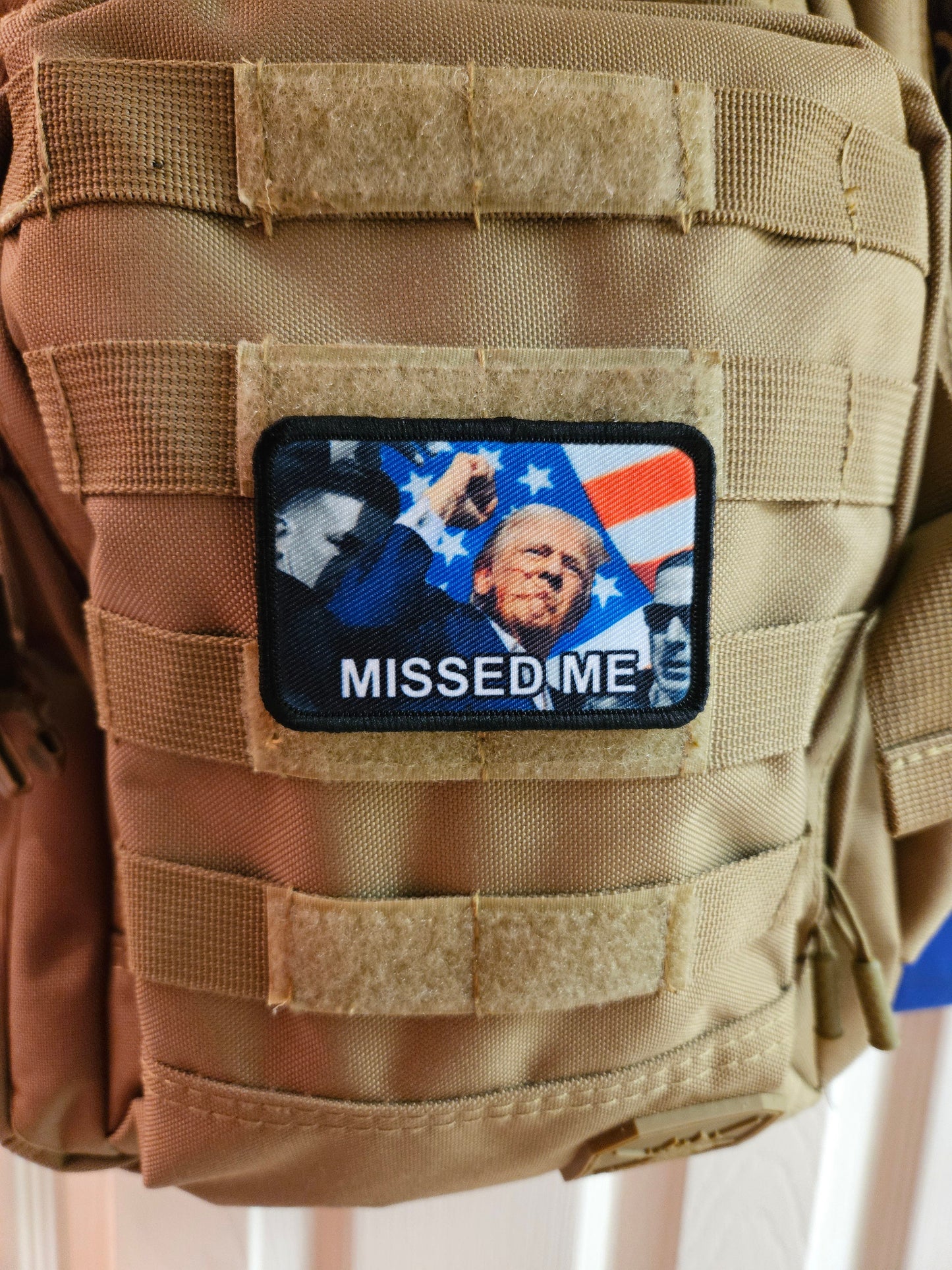 trump survived Flag background fist in the air missed me 2"x3" morale patch with hook and loop backing military joke meme