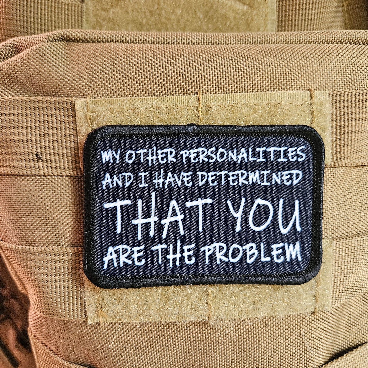 My other personalities and I have determined that you are the problem patch 2" x3" inch morale patch hook and loop backing black and white