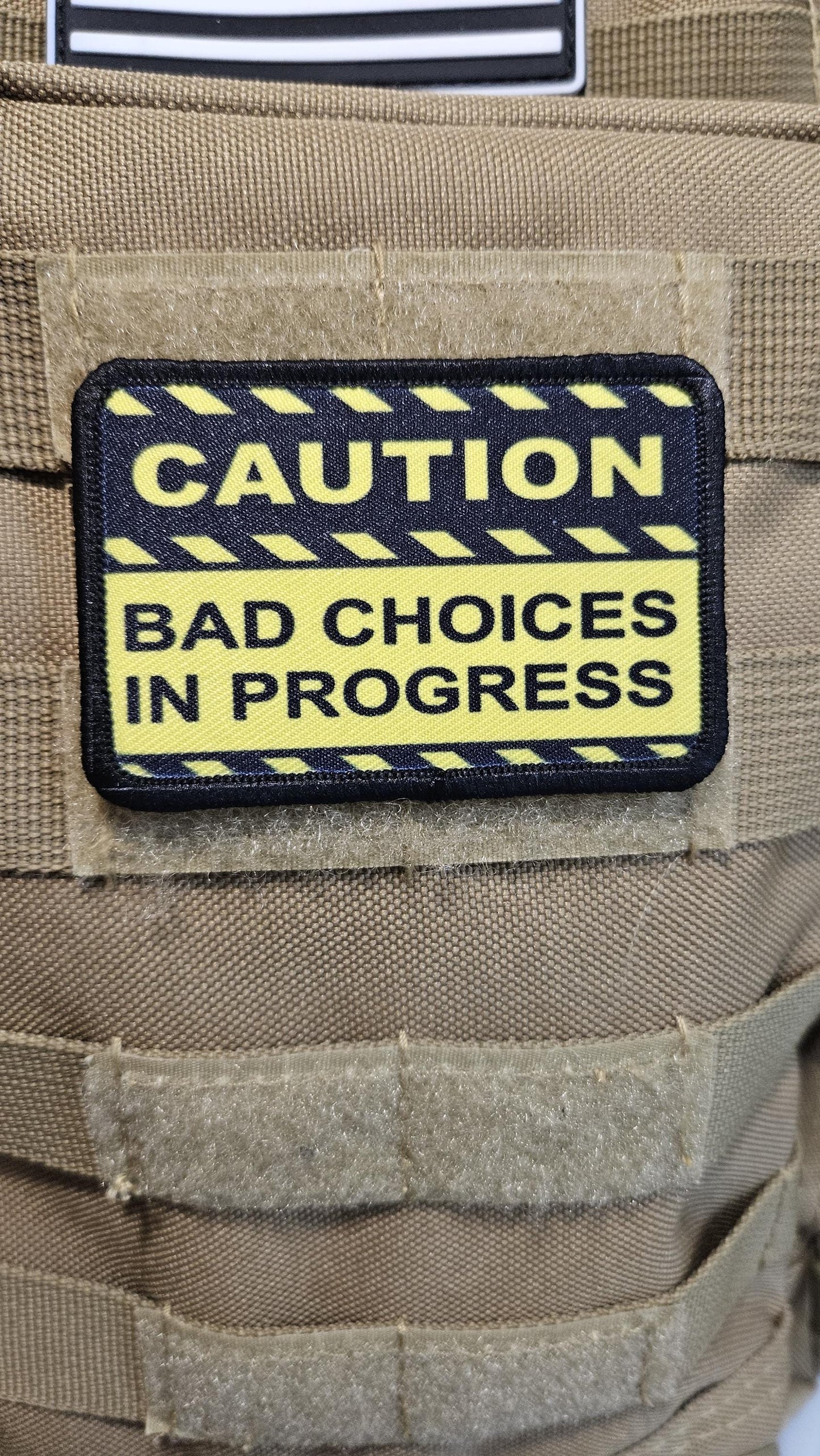 Caution bad choices in progress meme 2"x3" removable morale patch with hook and loop backing