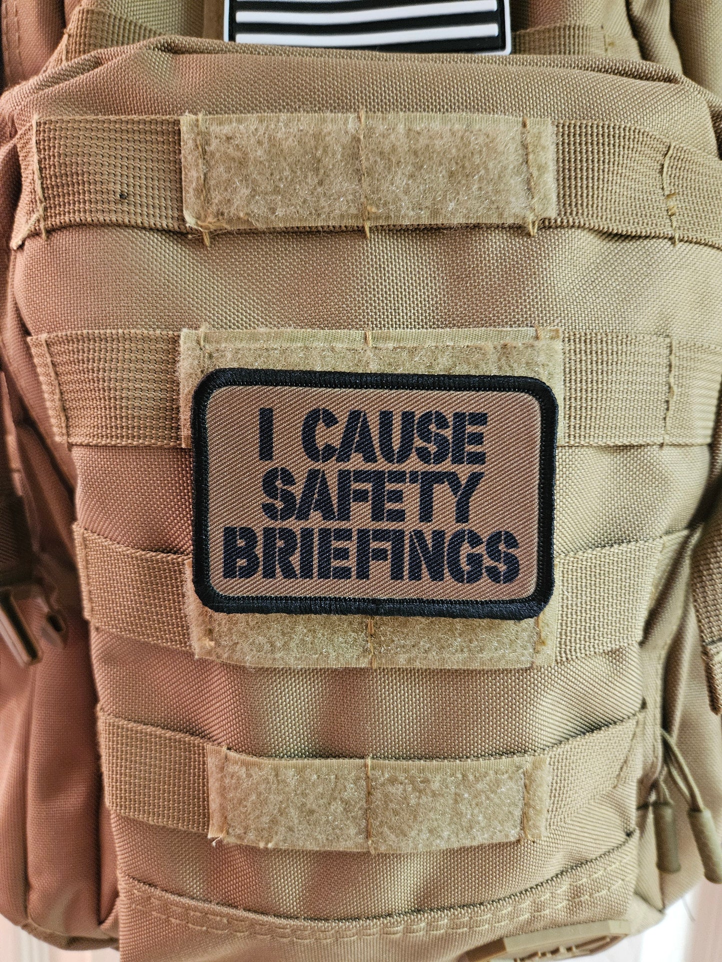 I cause safety briefings funny meme edc coyote brown 2"x3" morale patch with hook and loop backing military joke meme