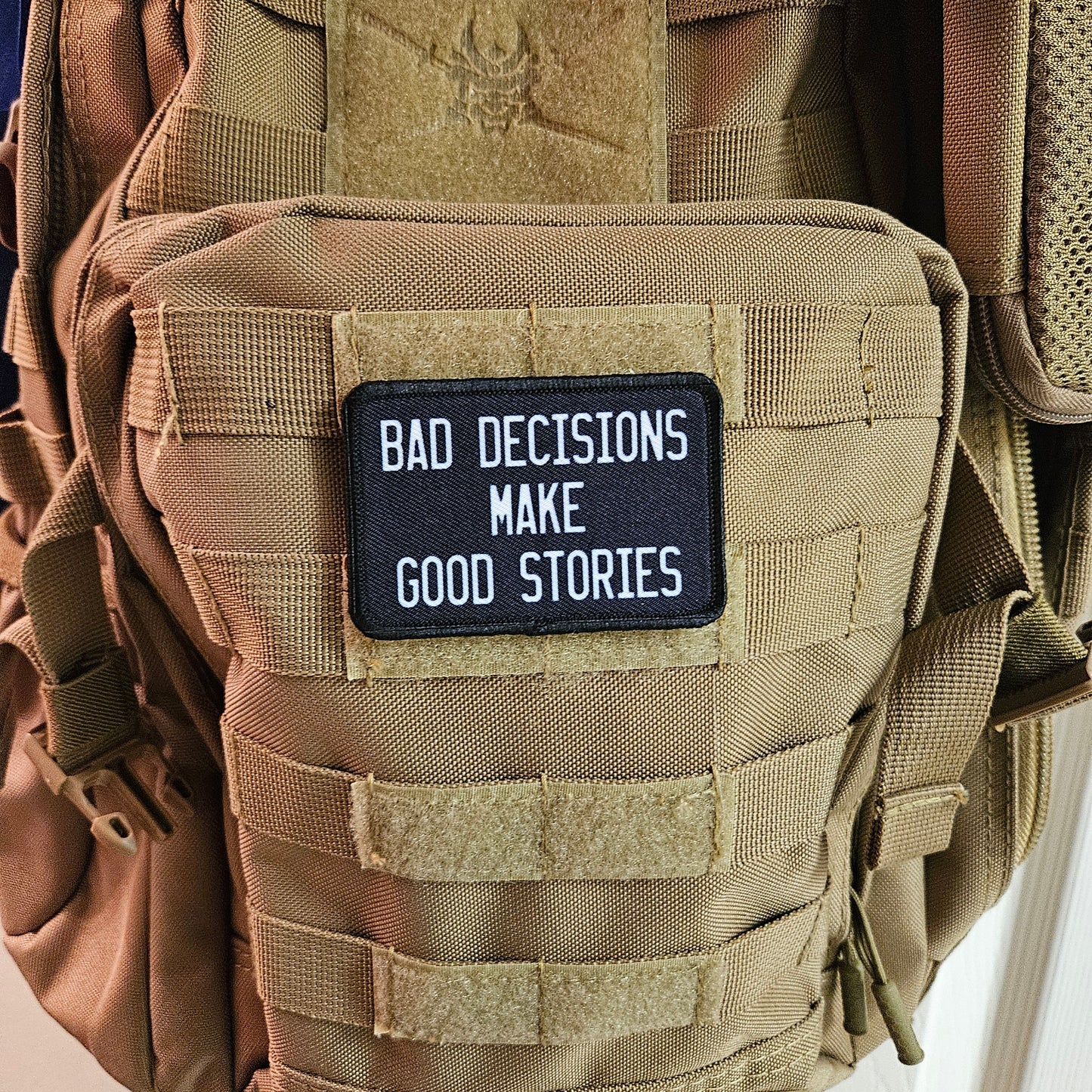 Bad decisions make good stories funny meme 2"x3" removable morale patch with hook and loop backing black and white