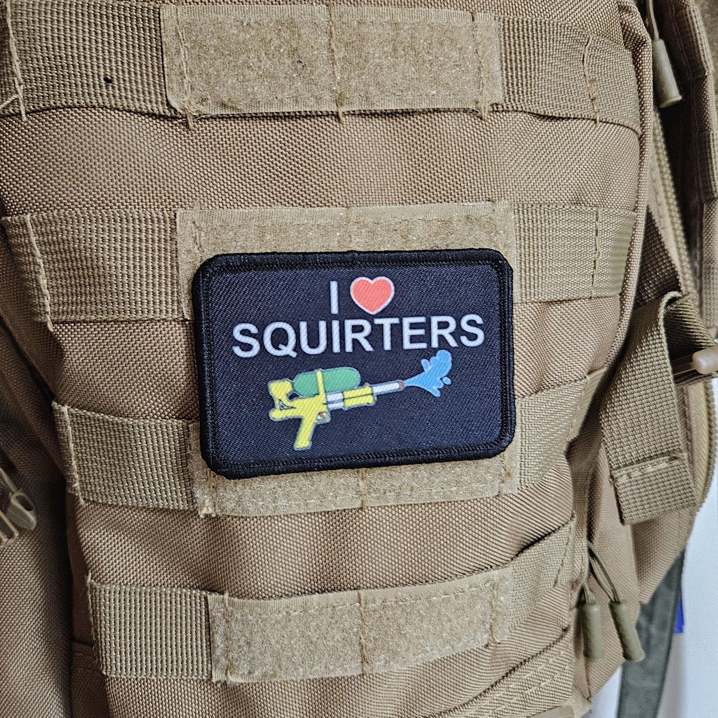 I love squirters meme 2"x3" morale patch with hook and loop backing