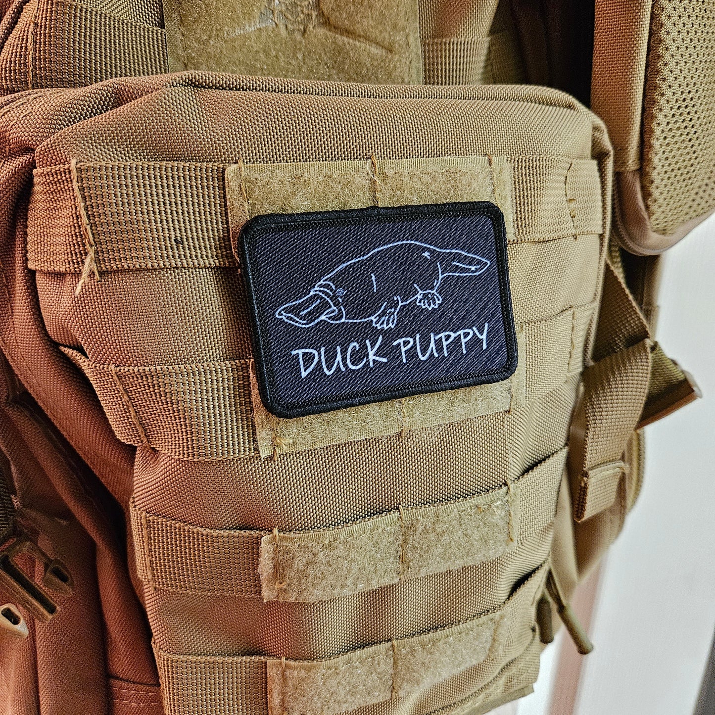 Duck puppy duck billed platypus black meme funny 2"x3" morale patch with hook and loop backing
