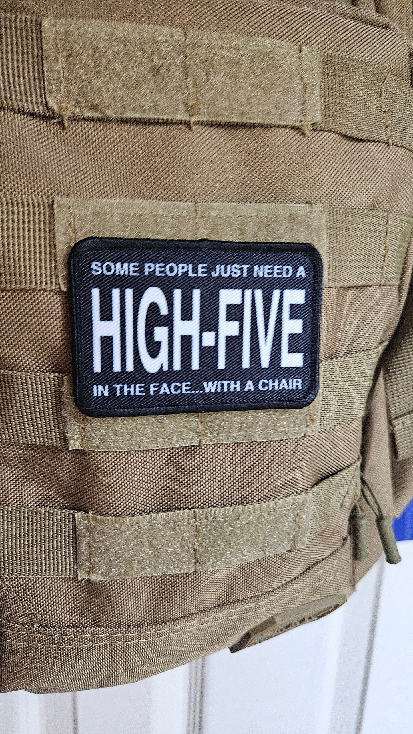 Some people just need a high-five in the face with a chair funny joke 2"x3" morale patch with hook and loop backing green background
