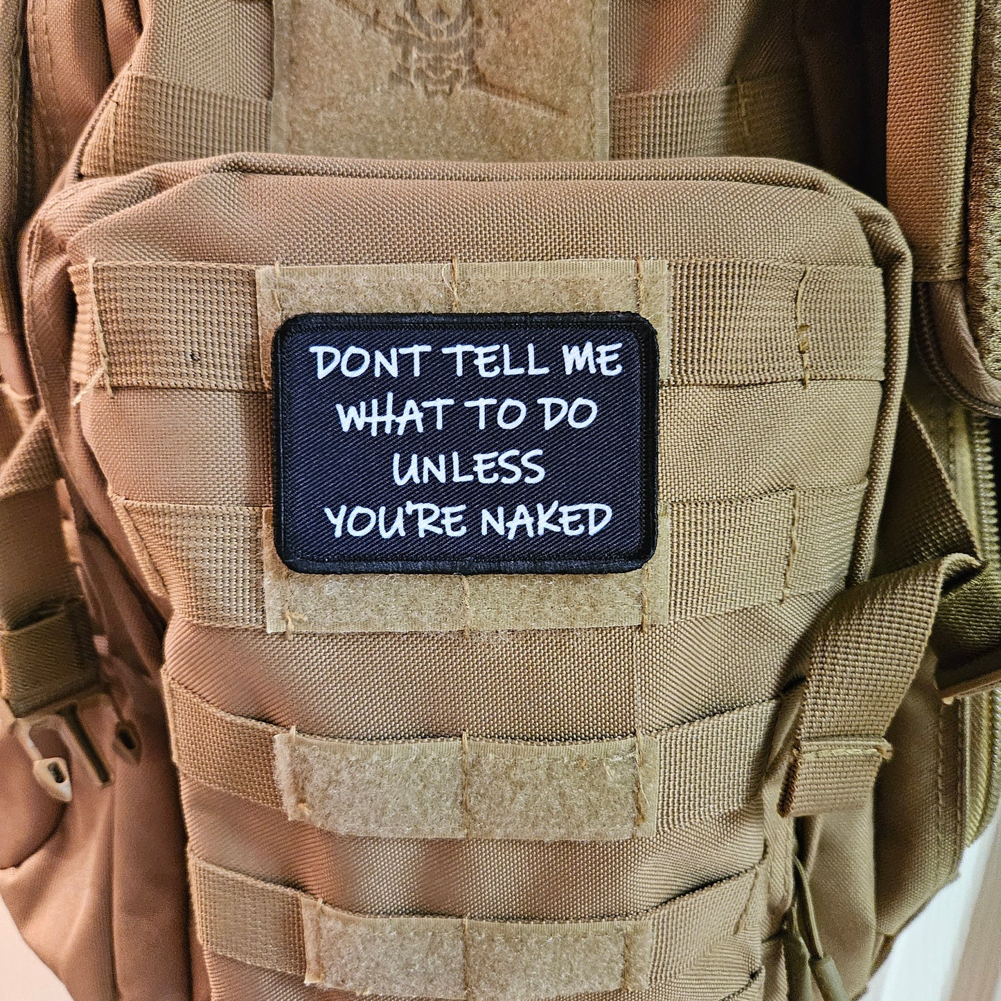 Don't tell me what to do unless you're naked 2"x3" morale patch with hook and loop backing