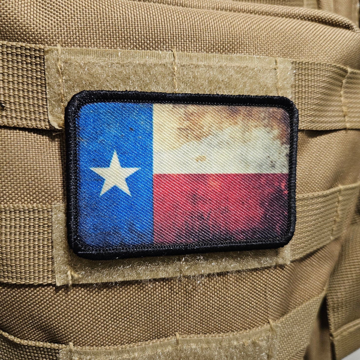 Distressed texas flag 2"x3" morale patch with hook and loop backing