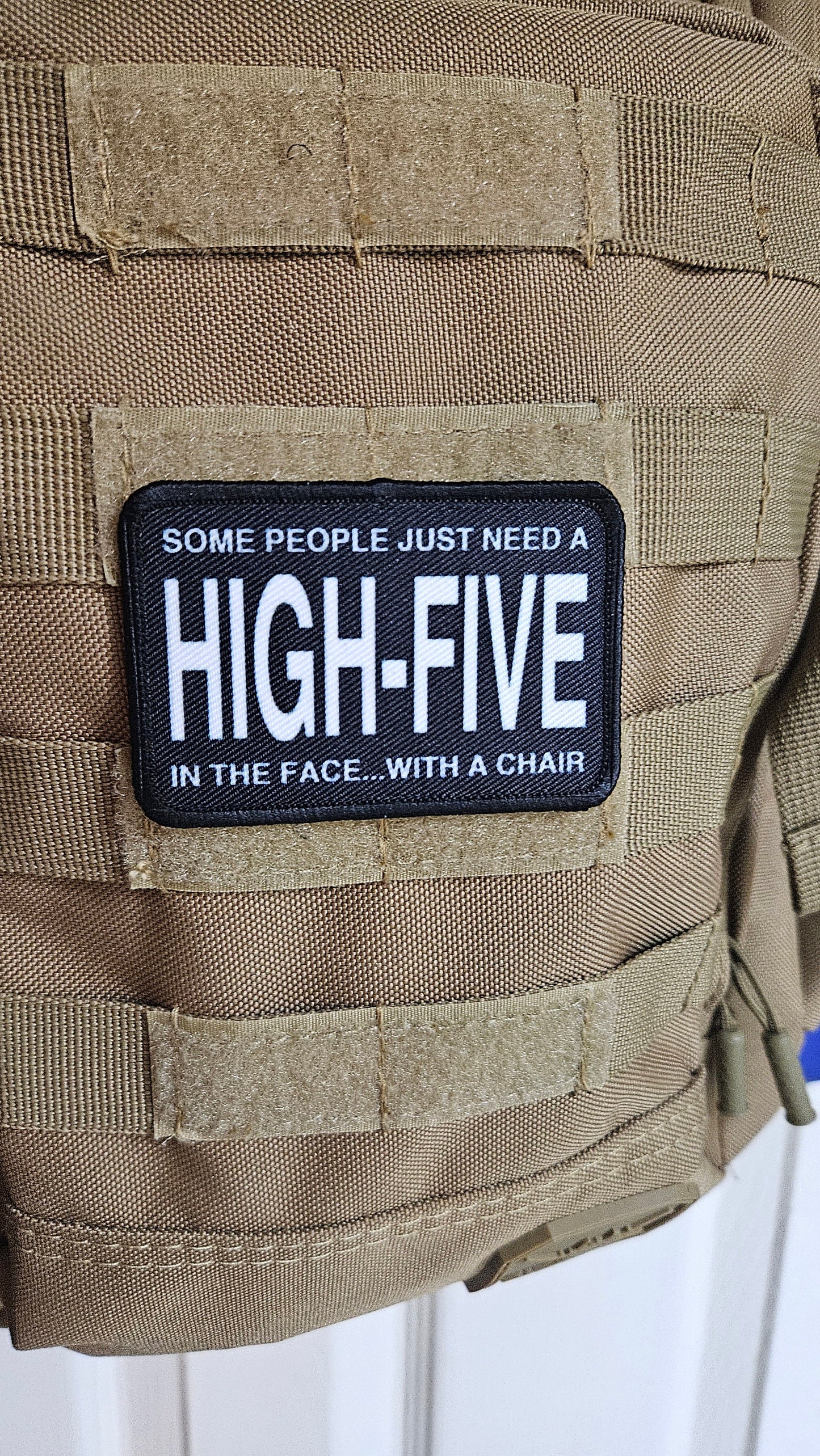 Some people just need a high-five in the face with a chair funny joke 2"x3" morale patch with hook and loop backing green background