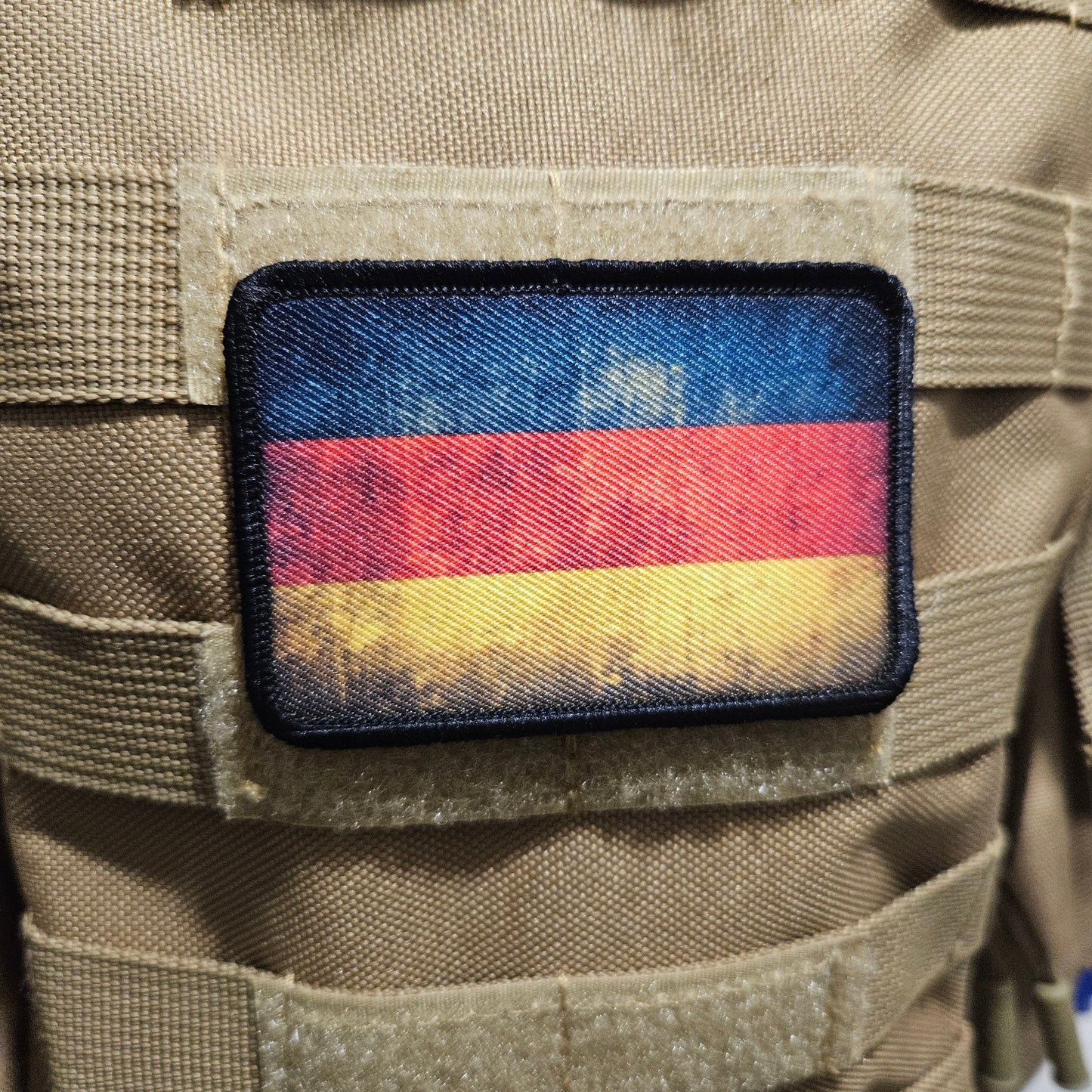 Distressed German flag 2"x3" morale patch with hook and loop backing