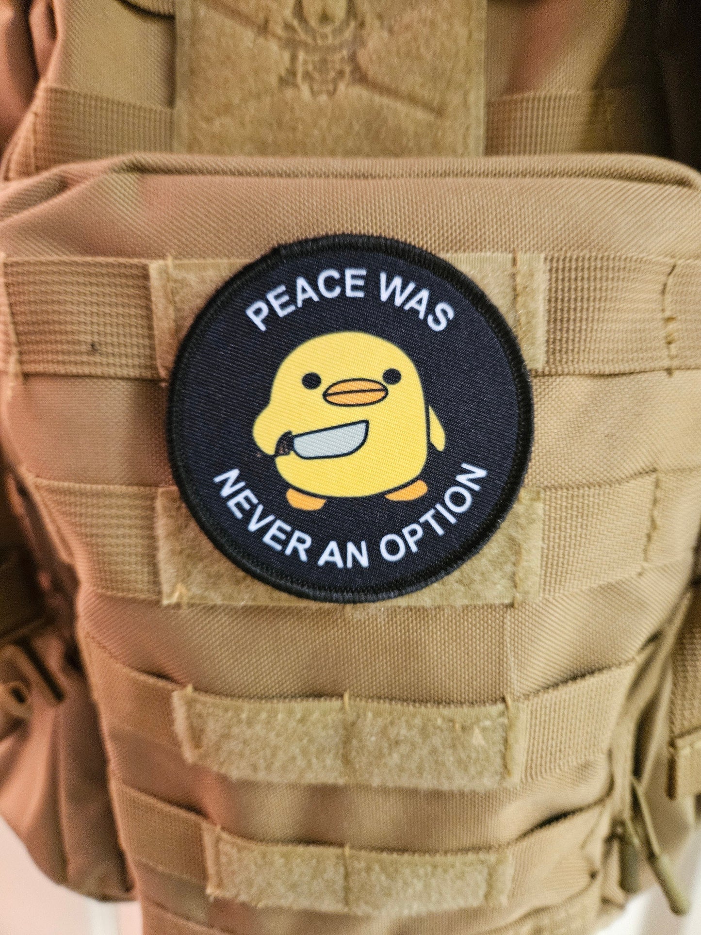 Peace was never an option duckling with knife meme 3" circle removable morale patch with hook and loop backing