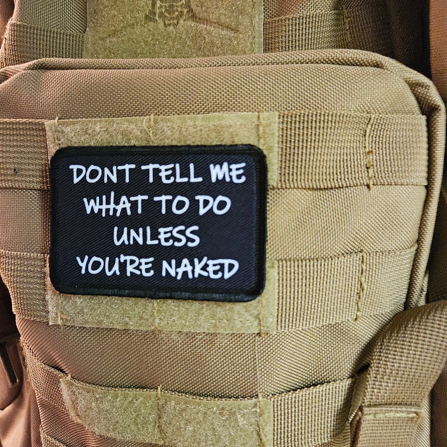 Don't tell me what to do unless you're naked 2"x3" morale patch with hook and loop backing