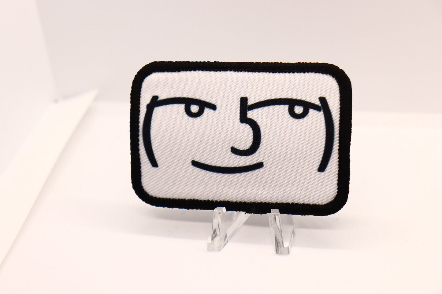 Lenny text face meme 2"x3" morale patch with hook and loop backing black