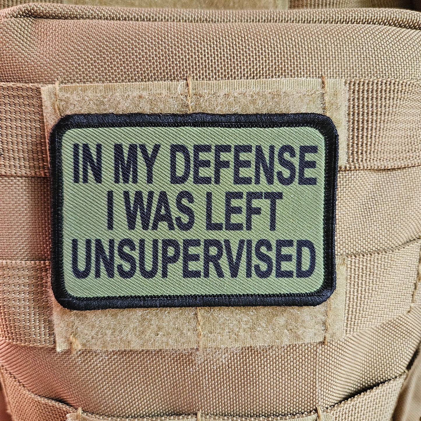 Green In My Defense I was left Unsupervised removable patch 2"x3" morale patch with hook and loop backing
