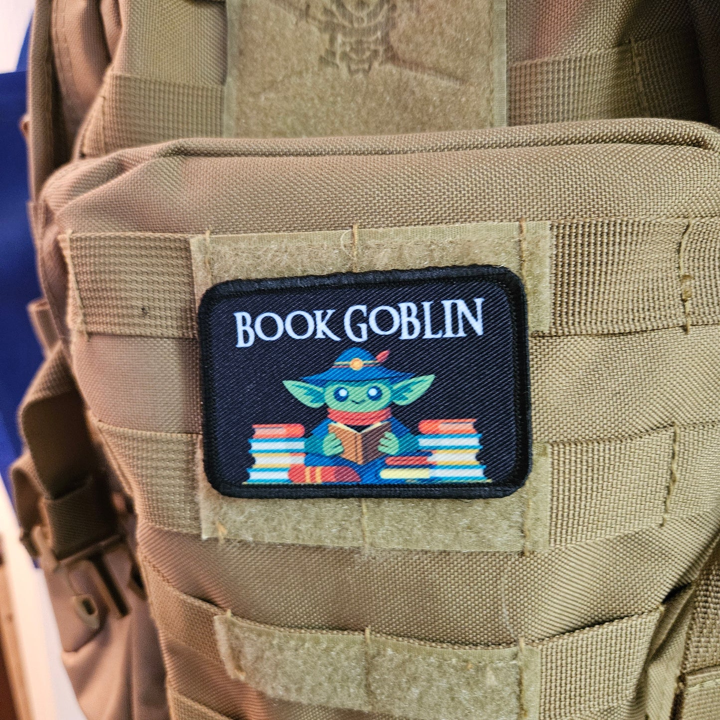 Book goblin reading joke book collection meme 2"x3" removable morale patch with hook and loop backing
