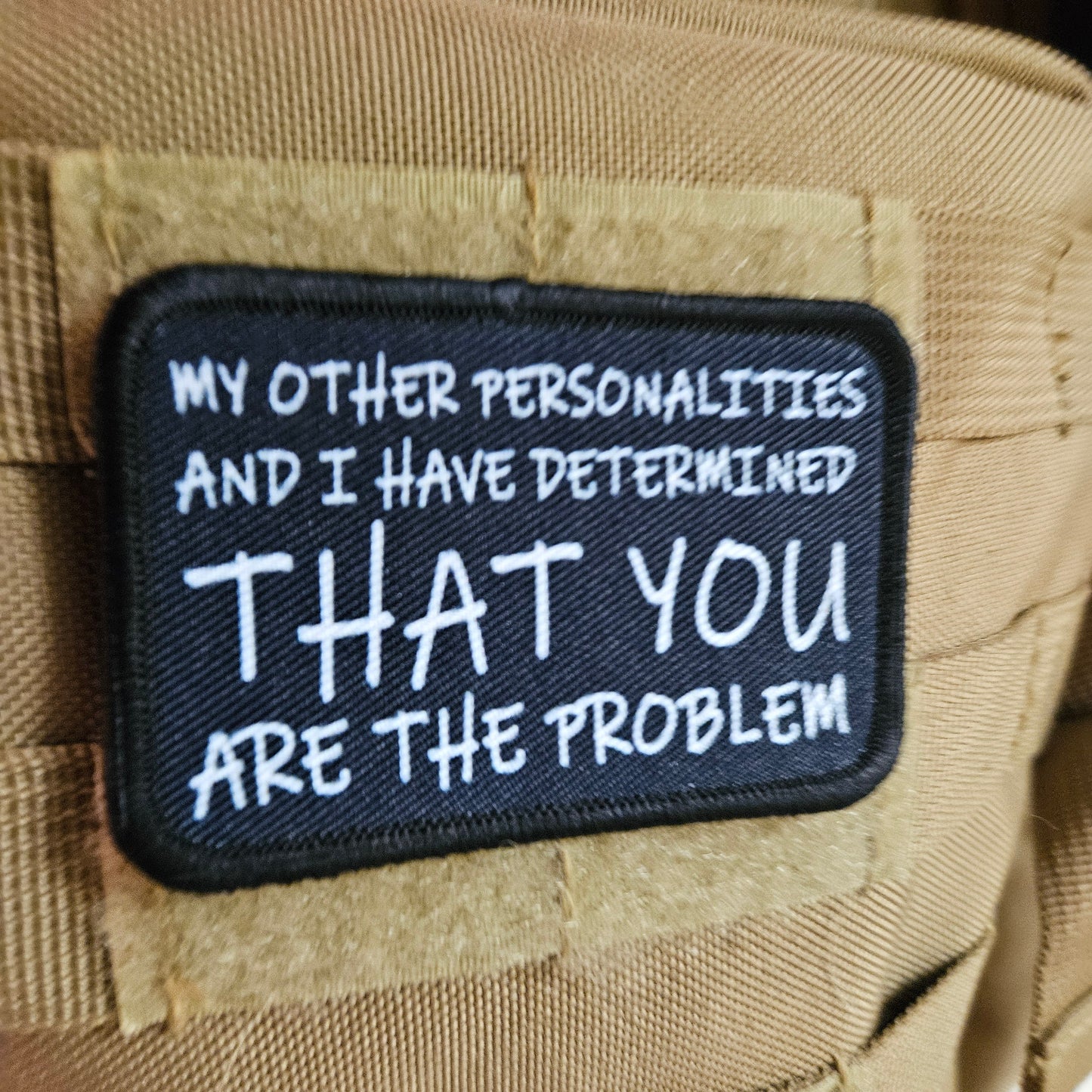 My other personalities and I have determined that you are the problem patch 2" x3" inch morale patch hook and loop backing black and white