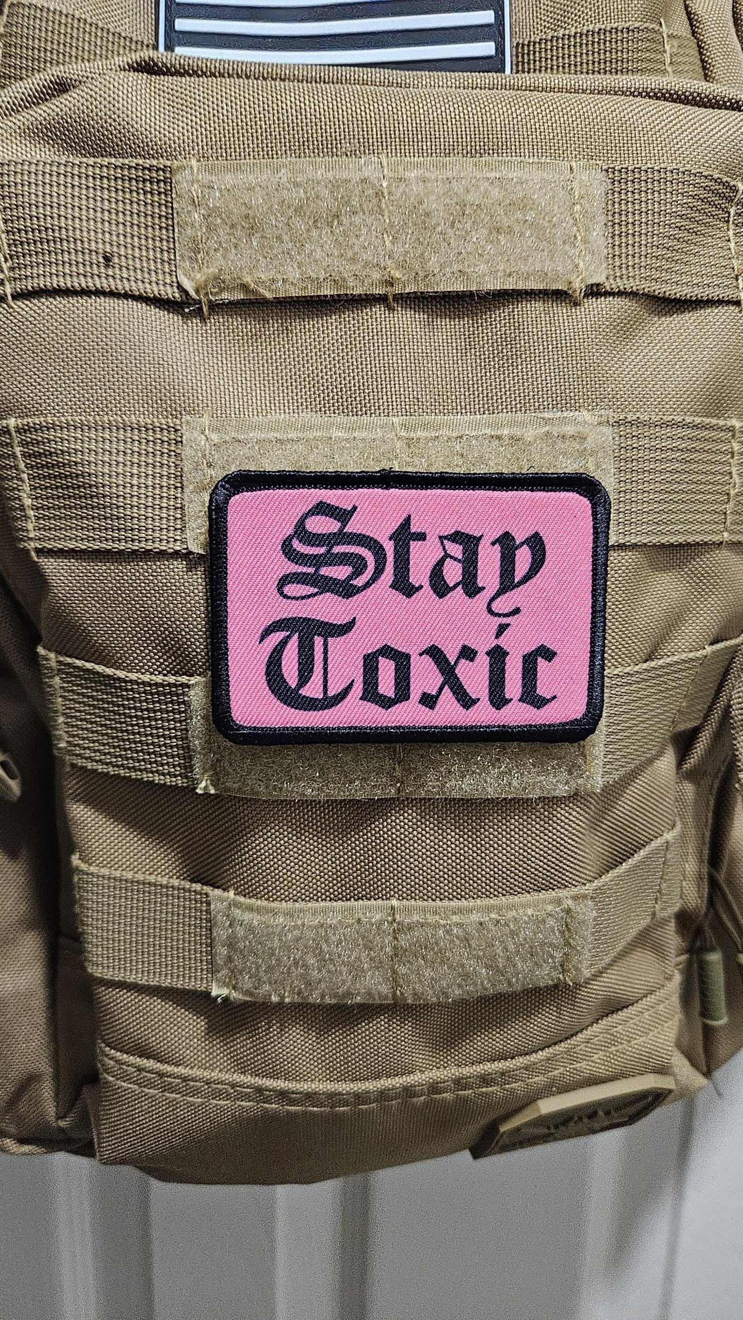 Stay toxic meme black on pink 2"x3" removable morale patch with hook and loop backing