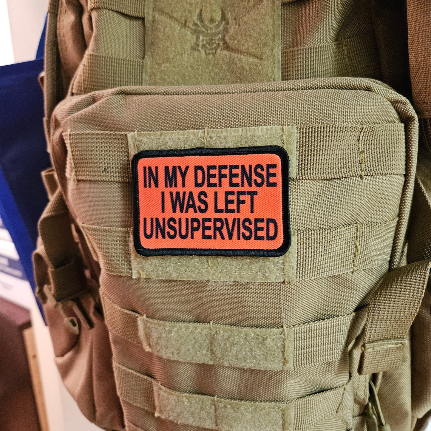 Red In My Defense I was left Unsupervised removable patch 2"x3" morale patch with hook and loop backing
