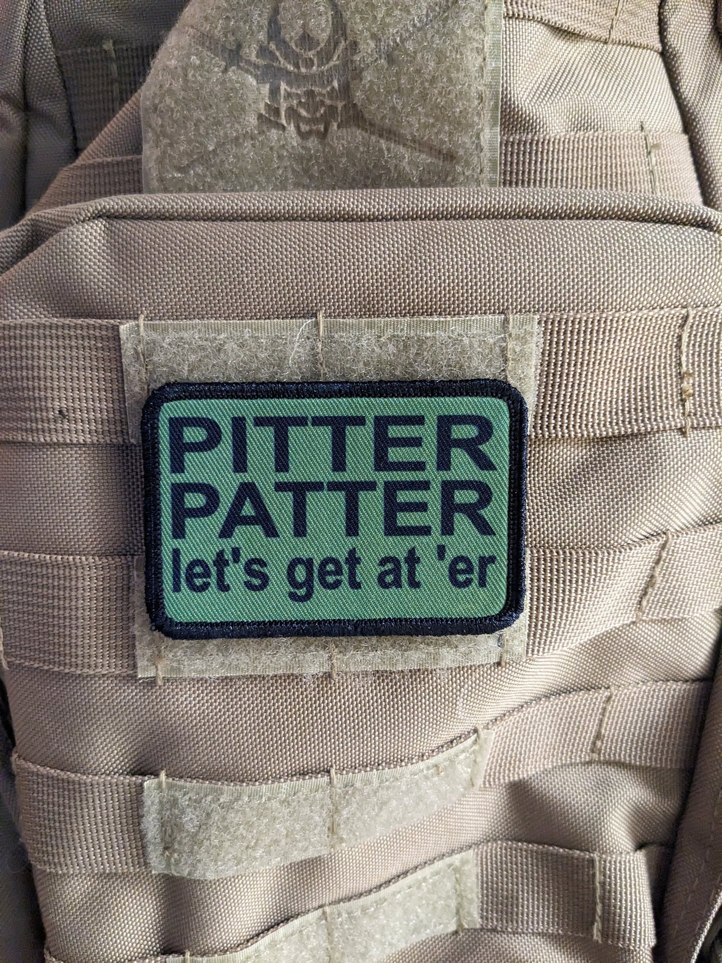 Olive green Pitter patter let's get at 'er meme 2"x3" removable morale patch with hook and loop backing