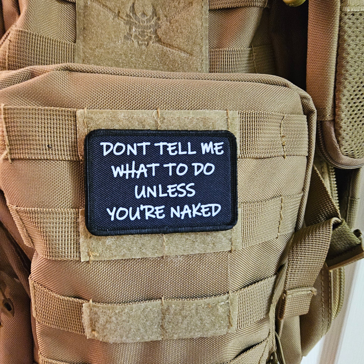 Don't tell me what to do unless you're naked 2"x3" morale patch with hook and loop backing
