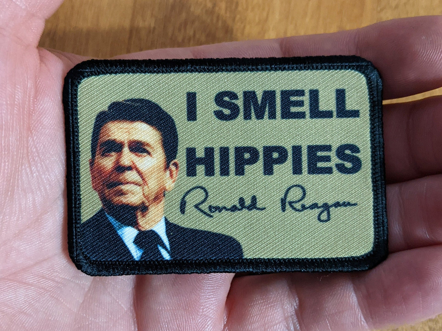 I smell hippies Ronald Reagan joke 2"x3" morale patch with hook and loop backing