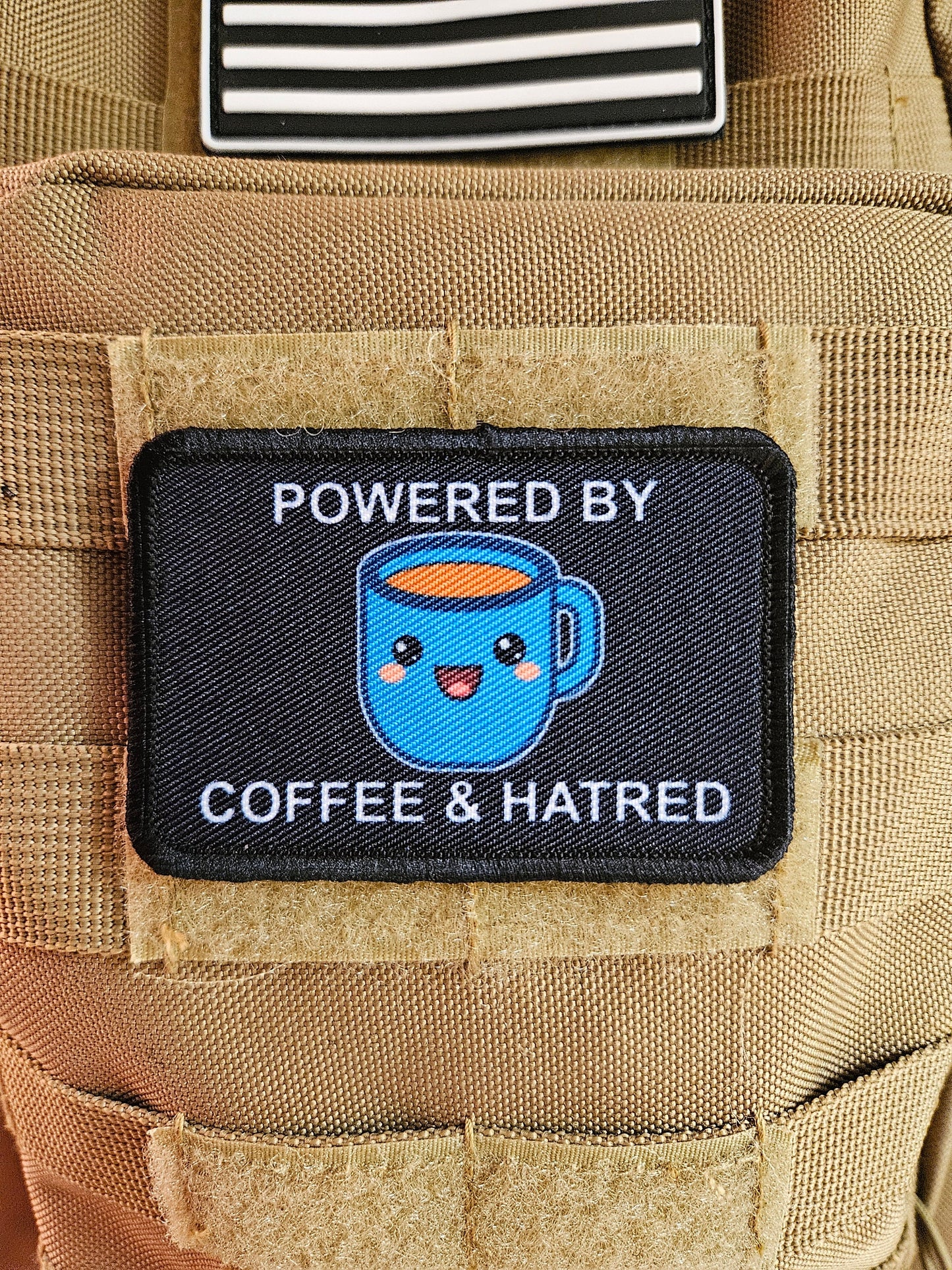 Powered by coffee and hatred meme 2"x3" removable morale patch with hook and loop backing