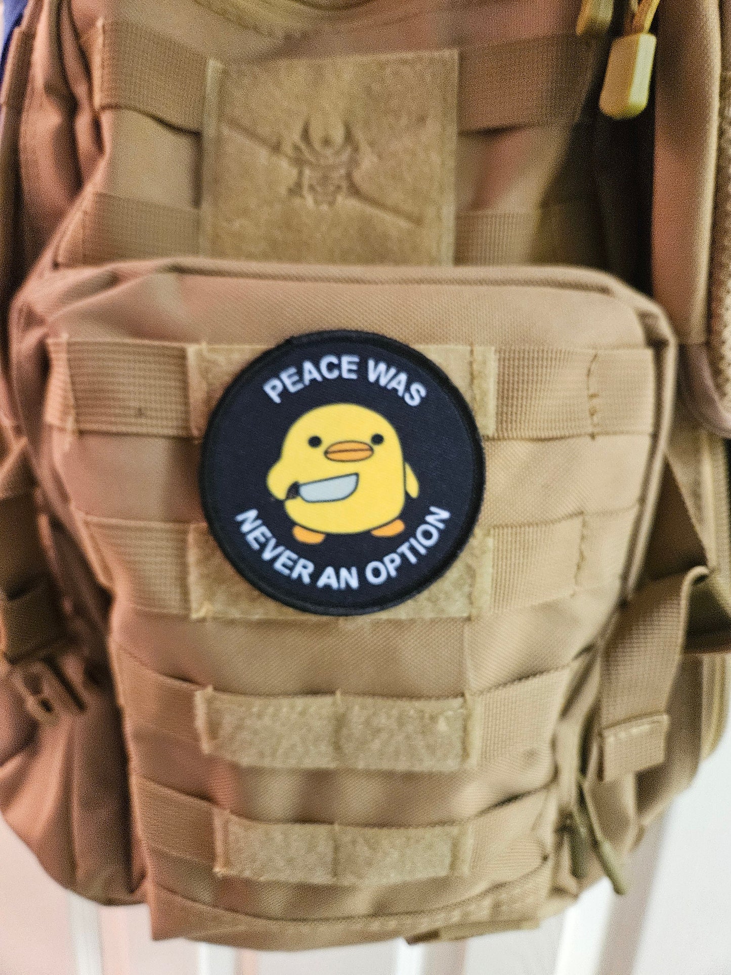 Peace was never an option duckling with knife meme 3" circle removable morale patch with hook and loop backing
