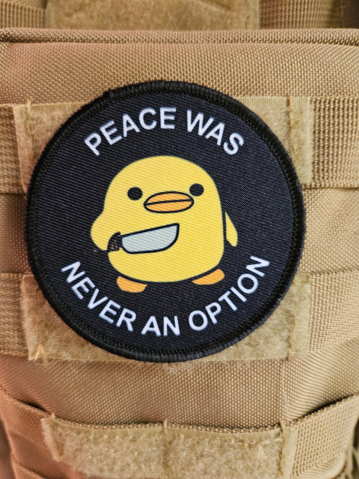 Peace was never an option duckling with knife meme 3" circle removable morale patch with hook and loop backing