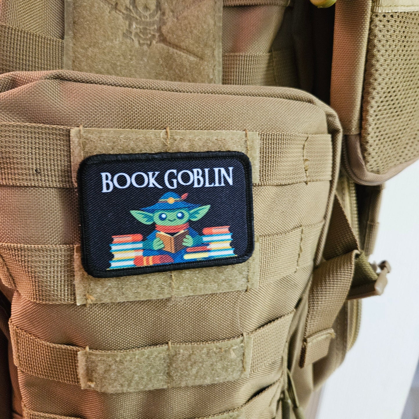 Book goblin reading joke book collection meme 2"x3" removable morale patch with hook and loop backing