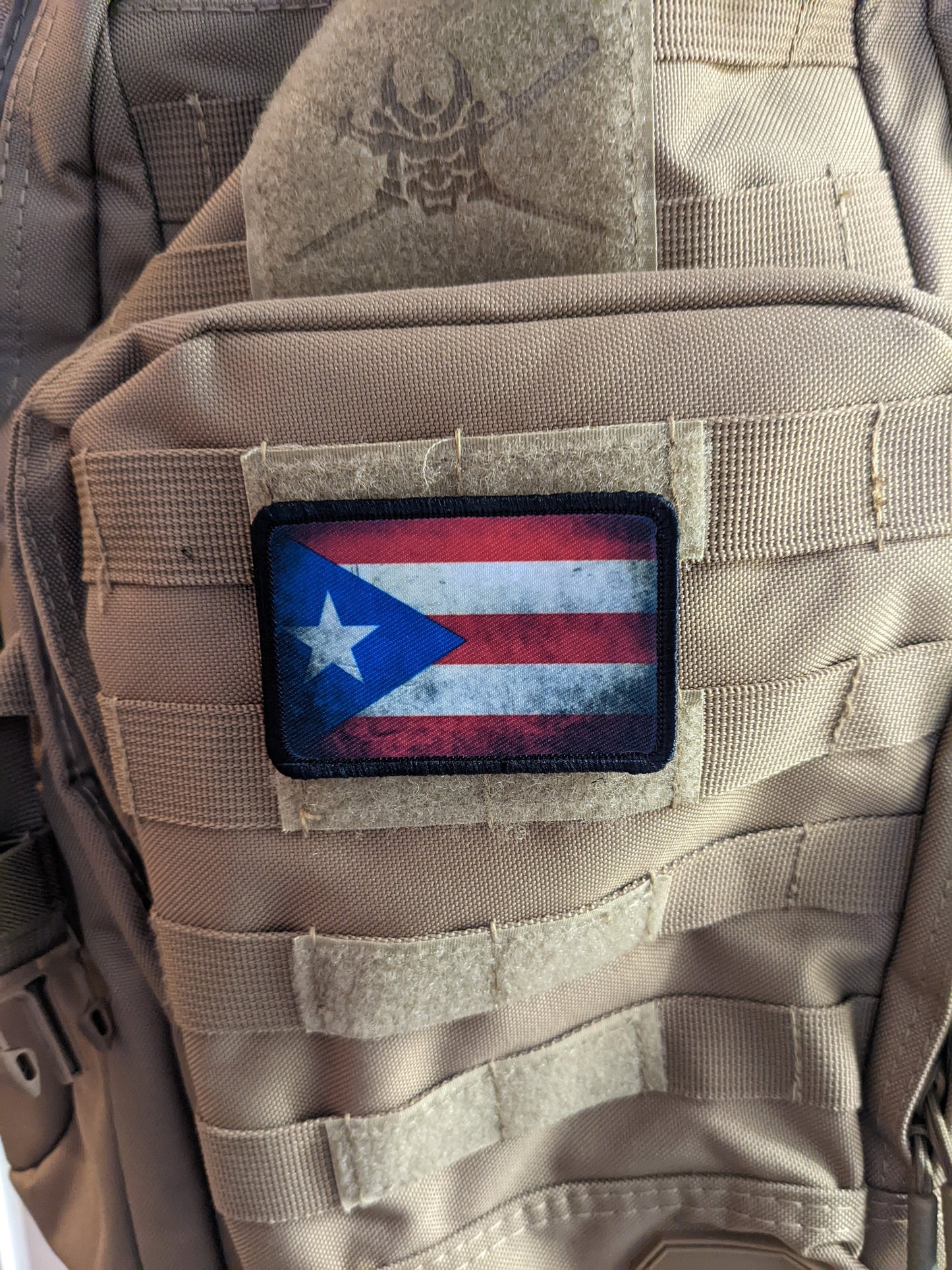 distressed flag of Puerto Rico worn 2"x3" morale patch with hook and loop backing