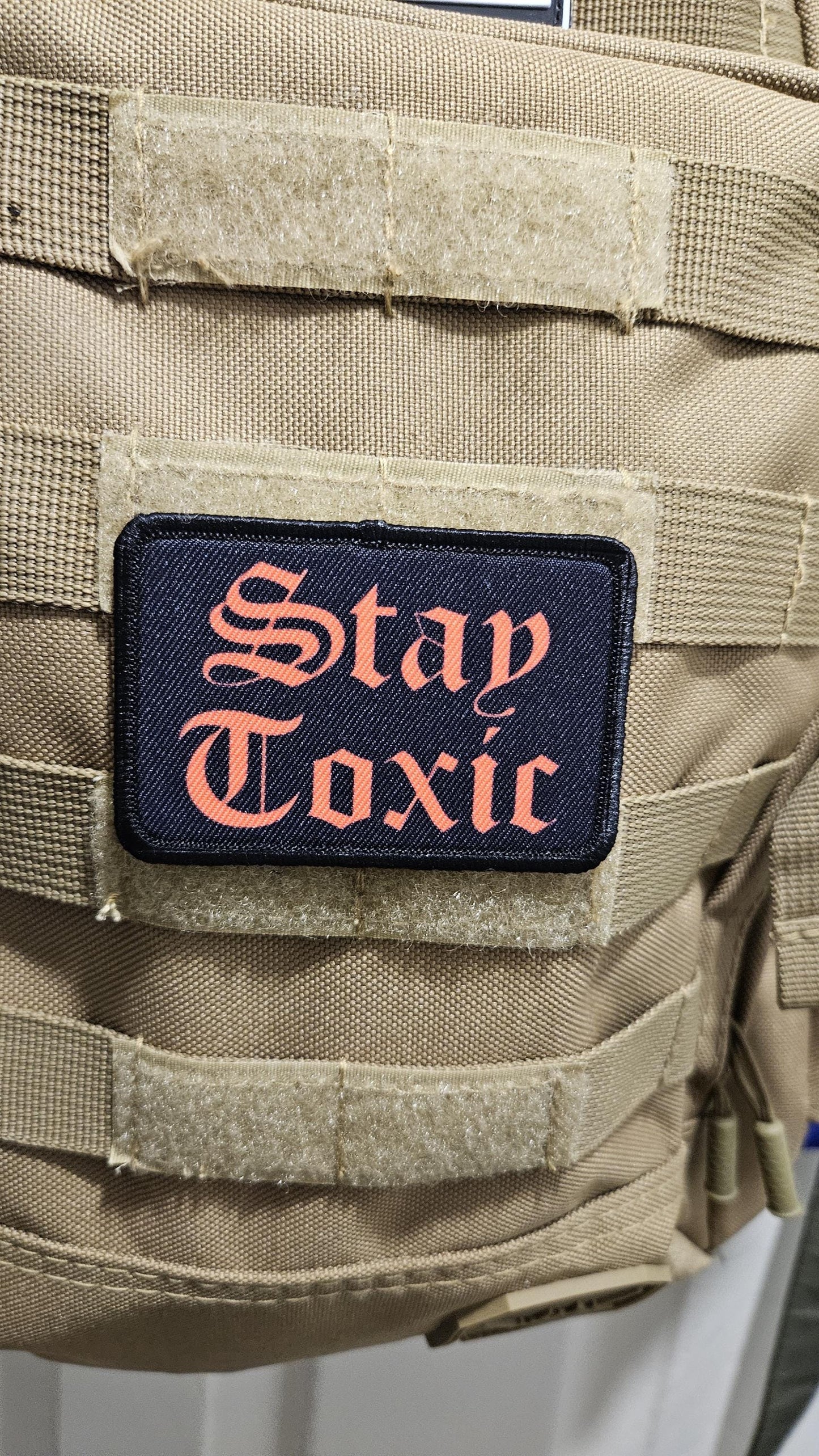 Stay toxic meme red on black 2"x3" removable morale patch with hook and loop backing