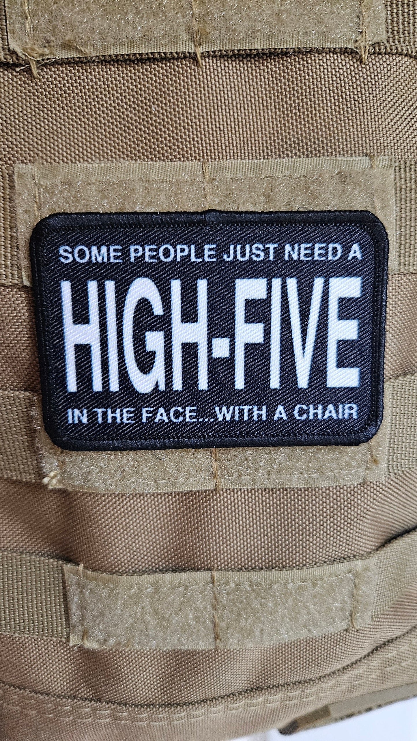 Some people just need a high-five in the face with a chair funny joke 2"x3" morale patch with hook and loop backing green background