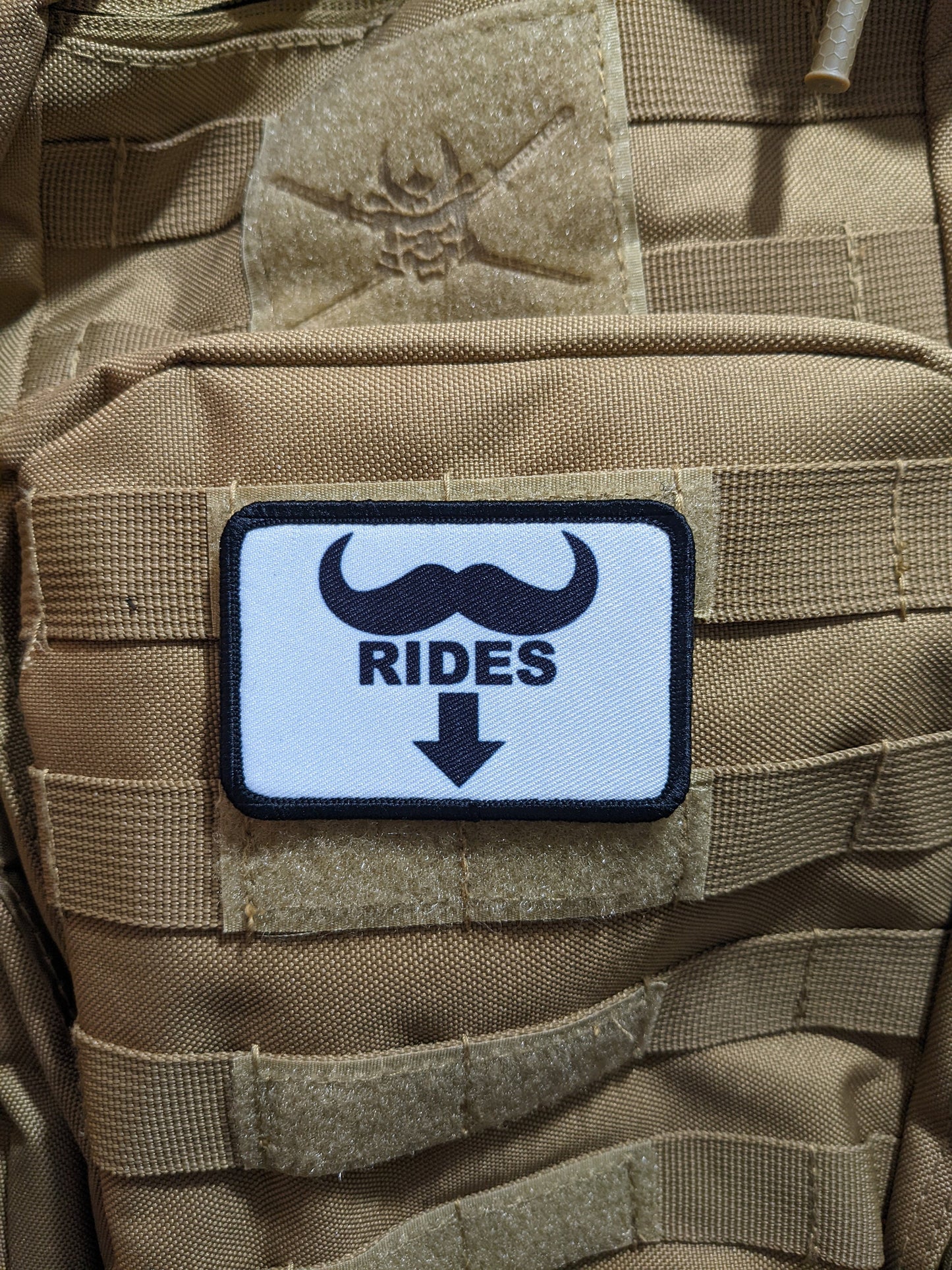 Mustache rides meme joke funny removable patch 2"x3" morale patch with hook and loop backing