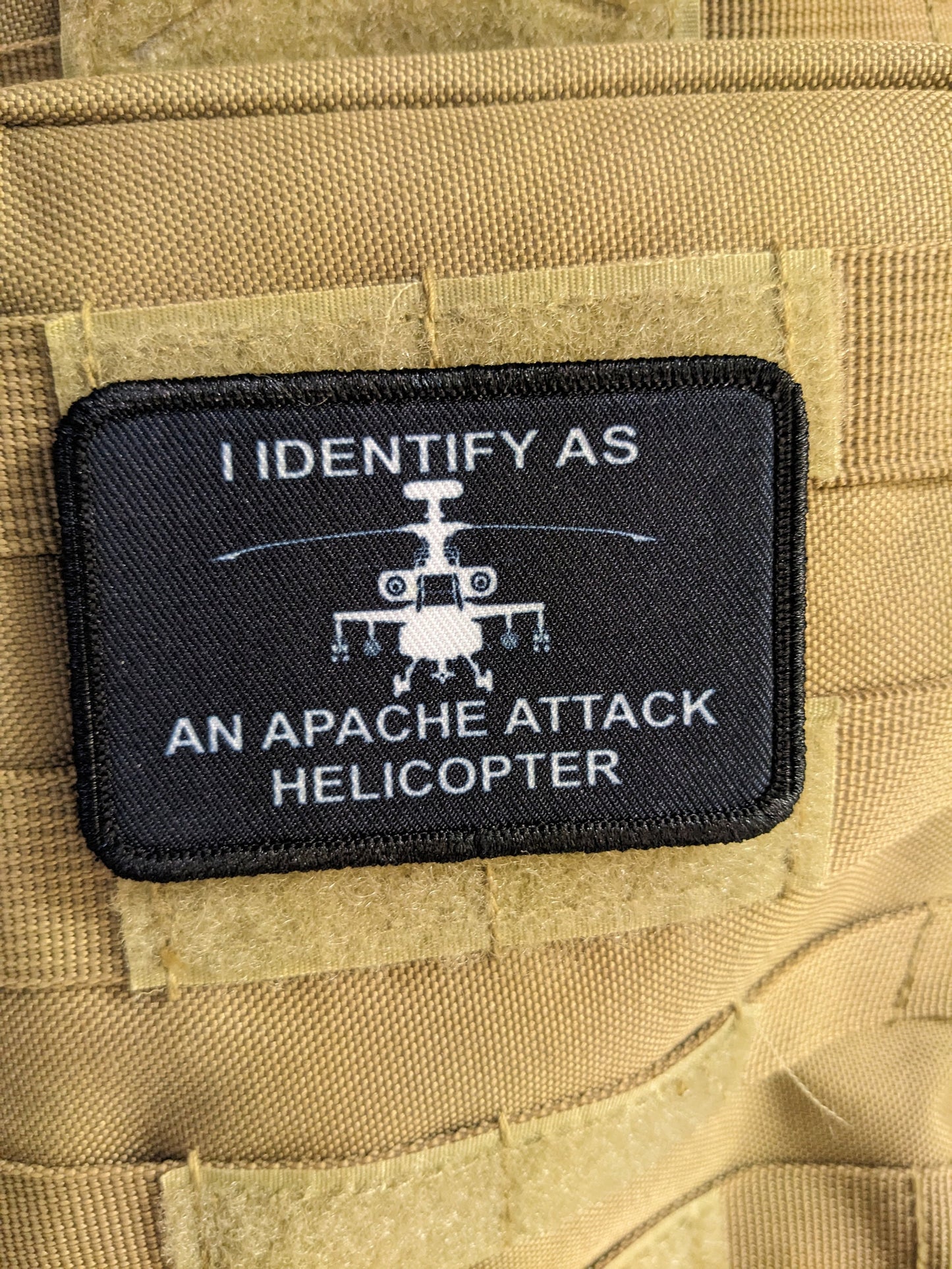I identify as an Apache attack helicopter 2"x3" morale patch with hook and loop backing