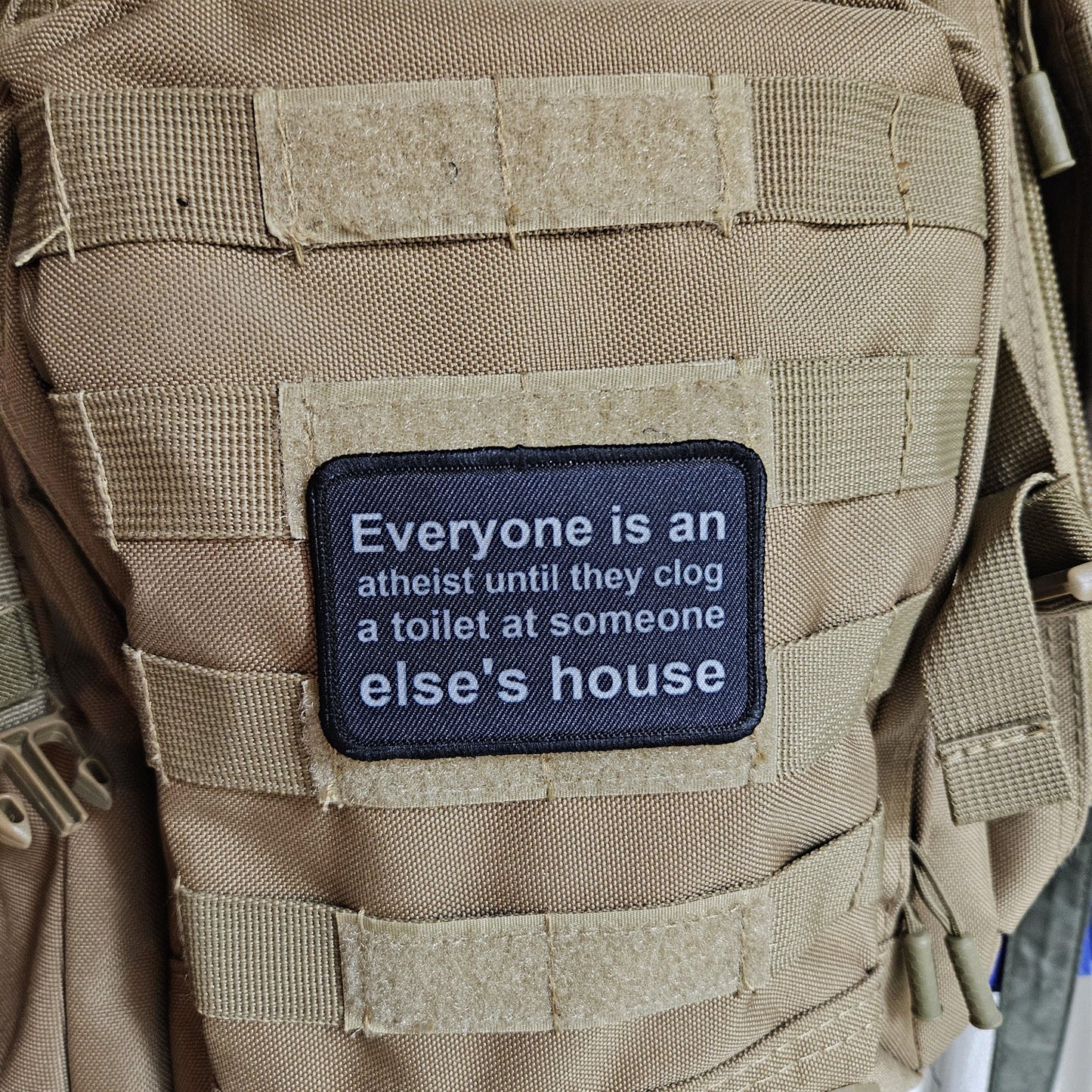 Everyone's an aetheist until they clog a toilet at somebody else's house 2"x3" removable morale patch with hook and loop backing