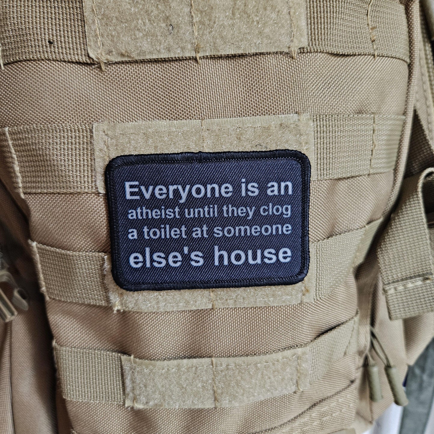 Everyone's an aetheist until they clog a toilet at somebody else's house 2"x3" removable morale patch with hook and loop backing