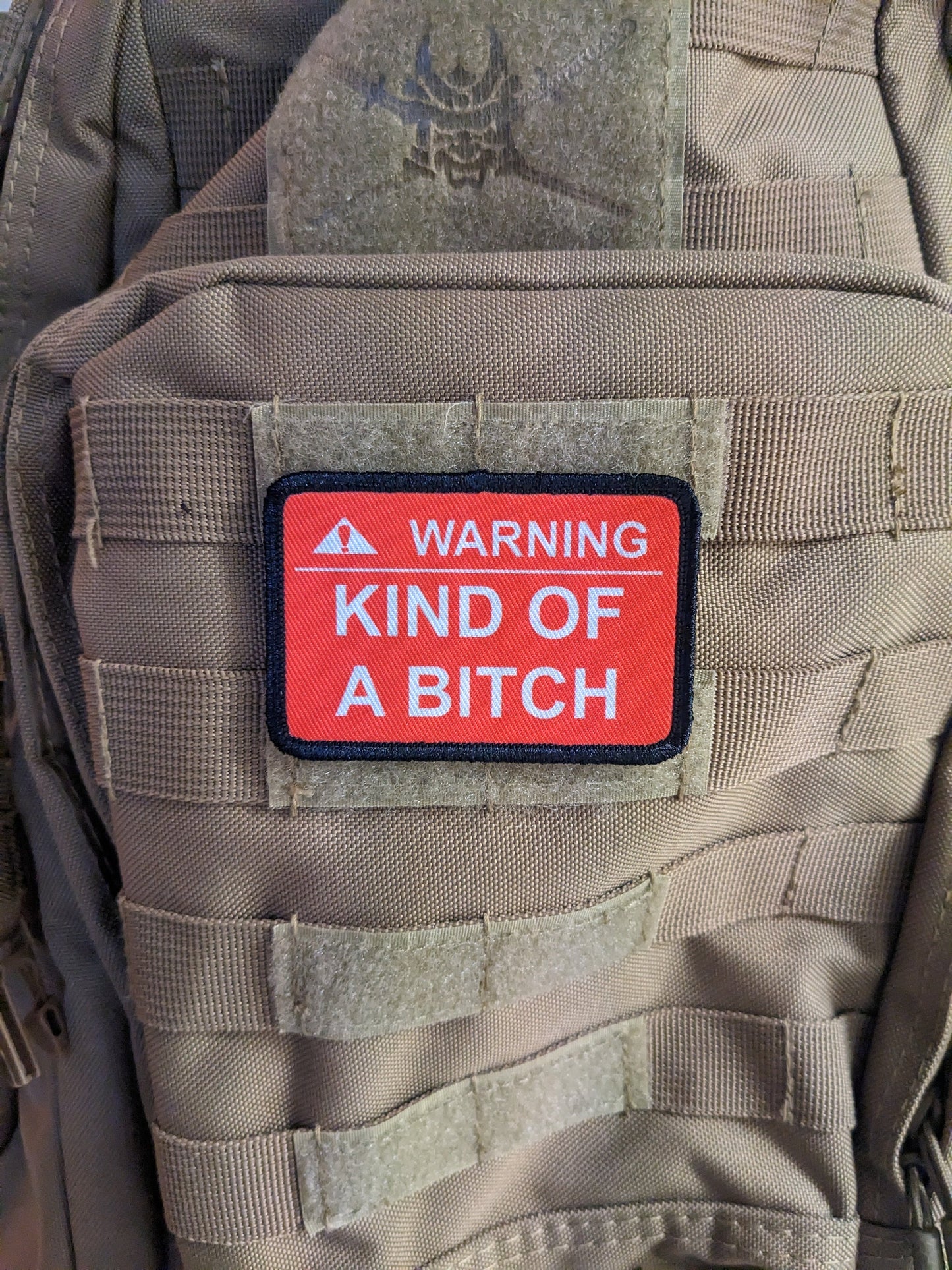 Warning kind of a bitch patch 2"x3" removable morale patch with hook and loop backing