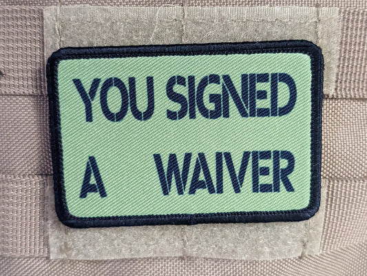 You signed a waiver  removable patch 2"x3" morale patch with hook and loop backing