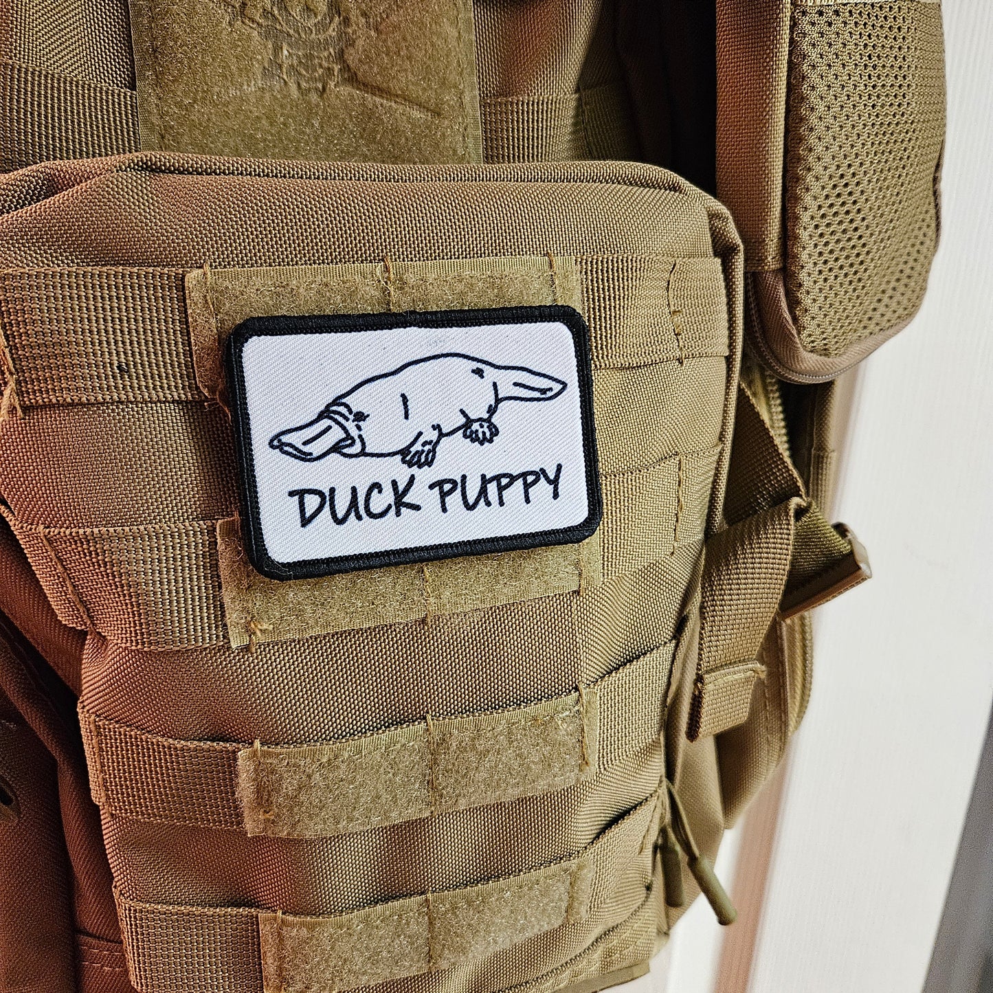 Duck puppy duck billed platypus white meme funny  2"x3" morale patch with hook and loop backing