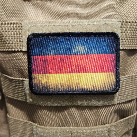Distressed German flag 2"x3" morale patch with hook and loop backing