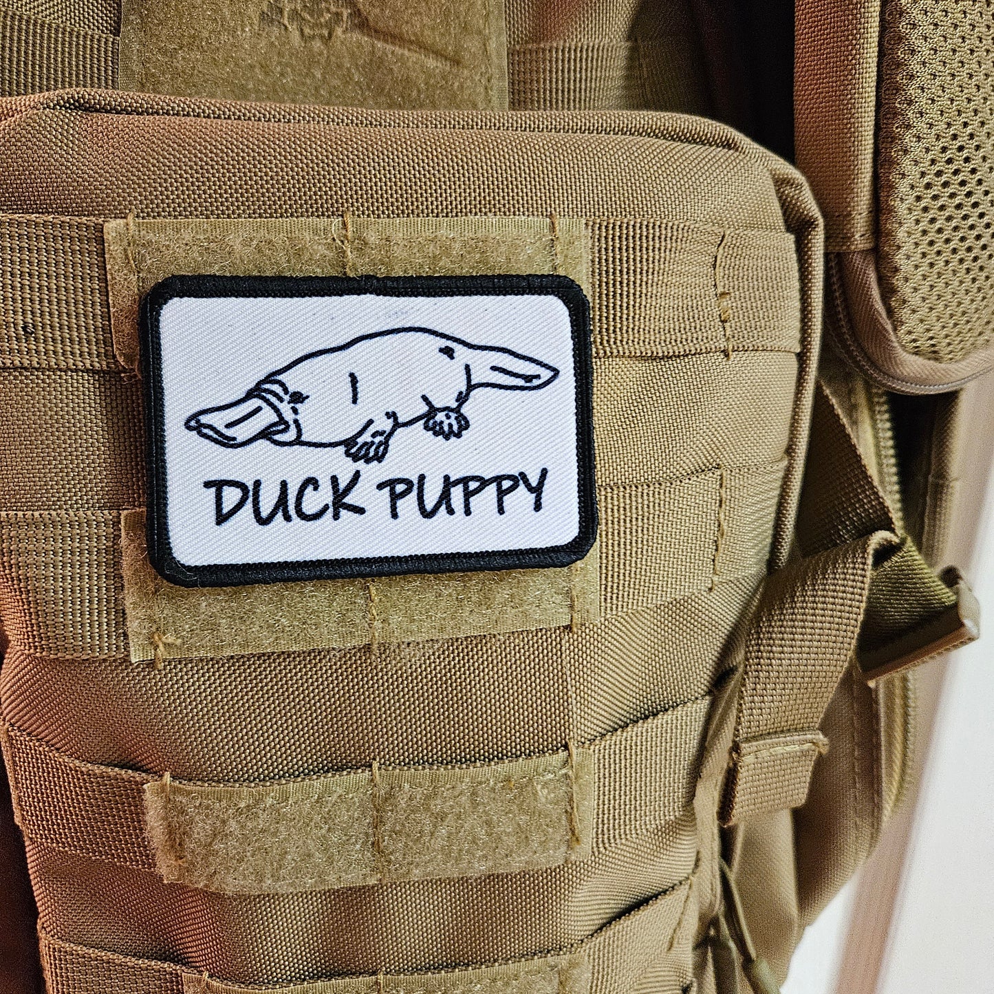 Duck puppy duck billed platypus white meme funny  2"x3" morale patch with hook and loop backing